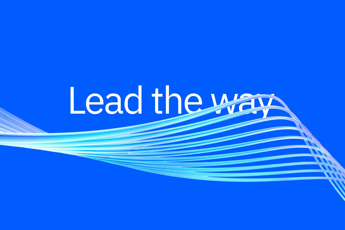 A bright blue brand graphic featuring the phrase “Lead the way” with dynamic flowing light-blue lines sweeping across the composition.