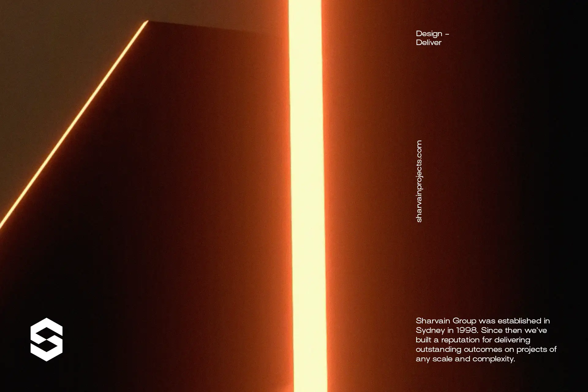 Abstract dark background with vertical glowing orange light strip and Sharvain Group logo in the corner.
