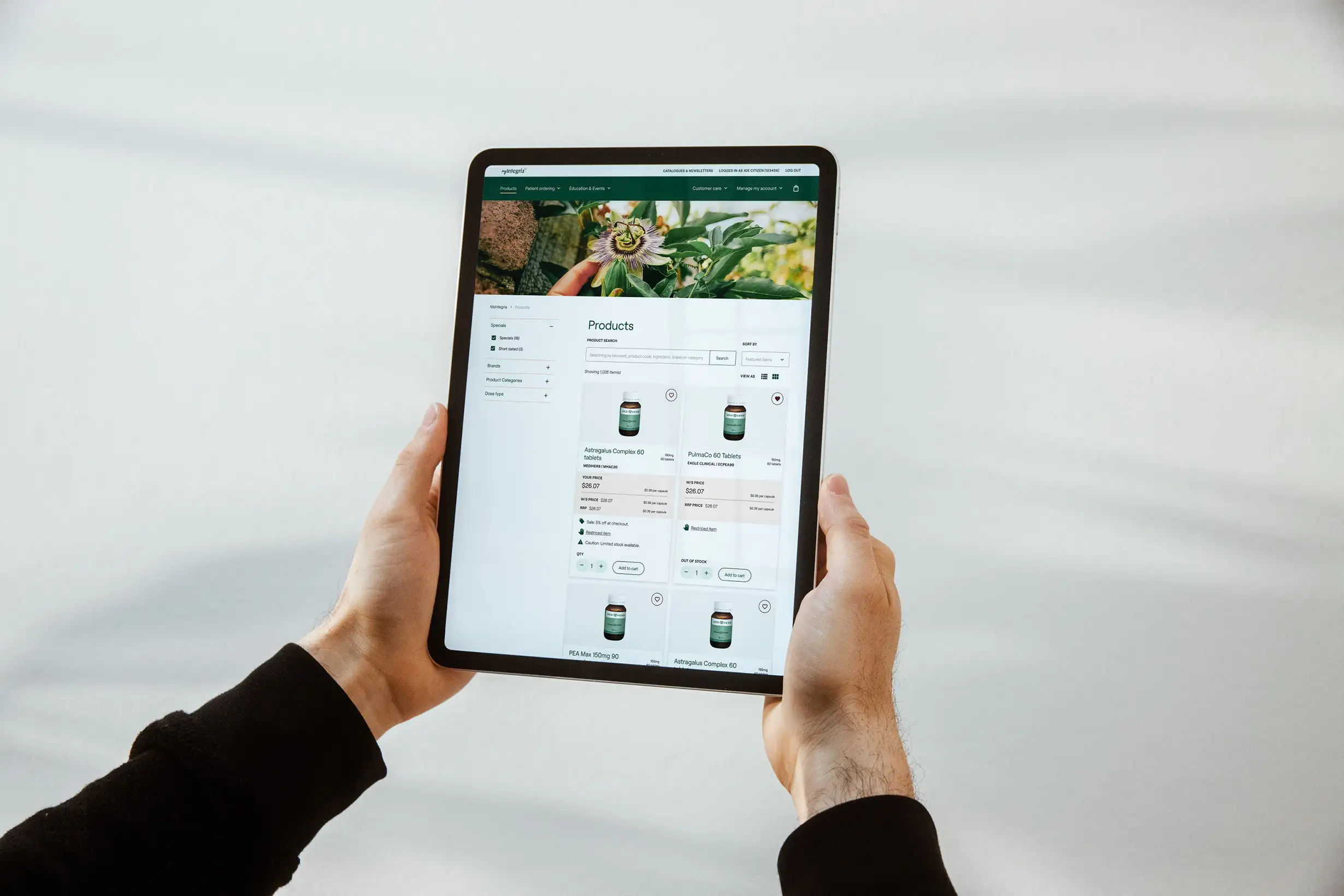 Product-listing interface on tablet showing improved filtering and clearer practitioner product details for faster decision-making.