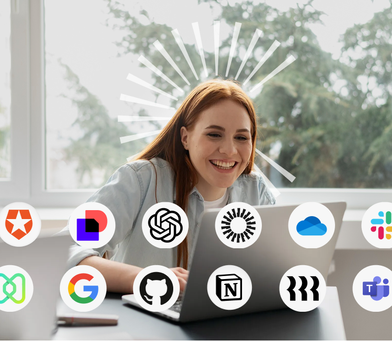 A woman sitting in front of a laptop computer.
