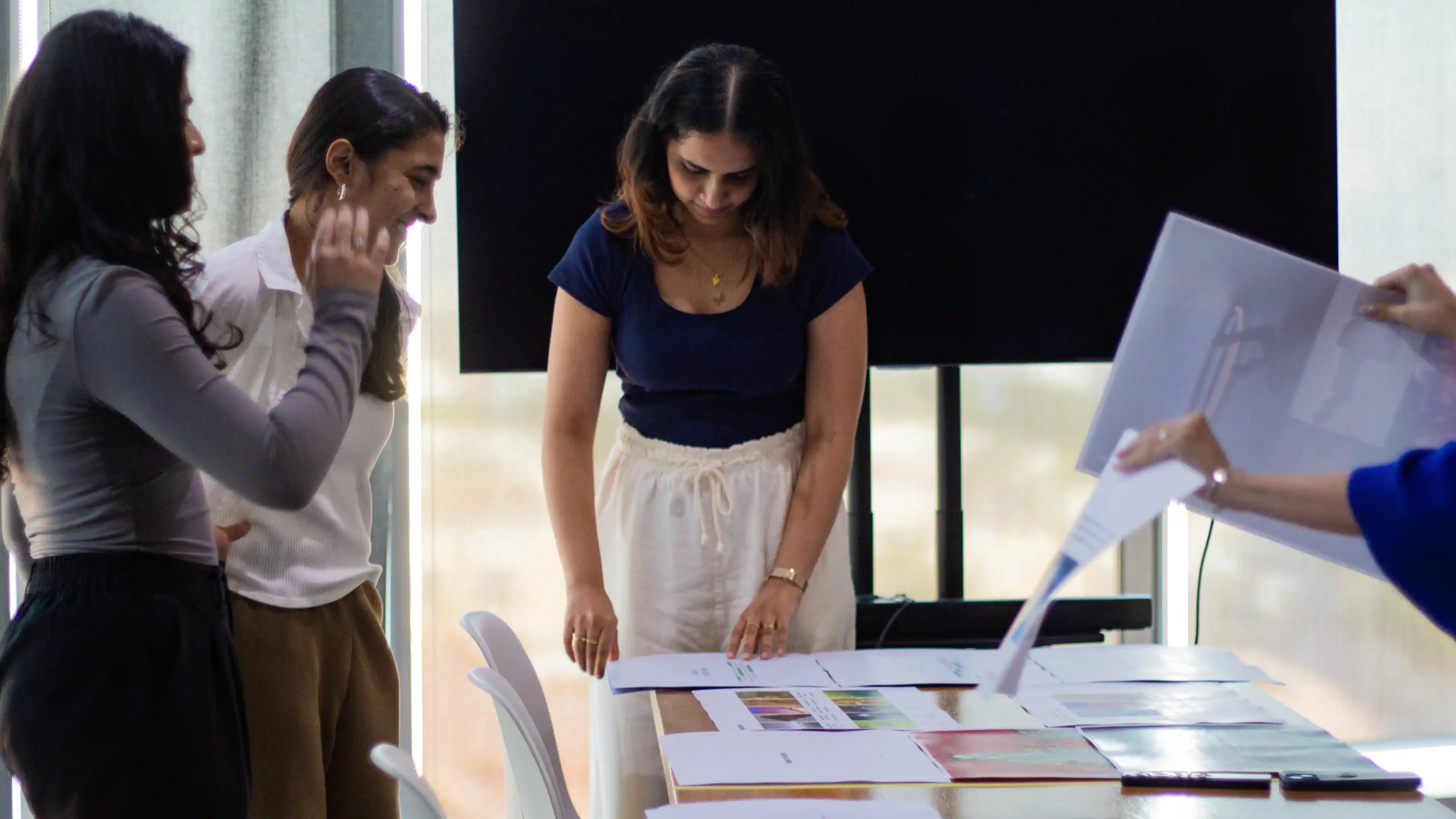 LIMAH designers preparing for an internal presentation
