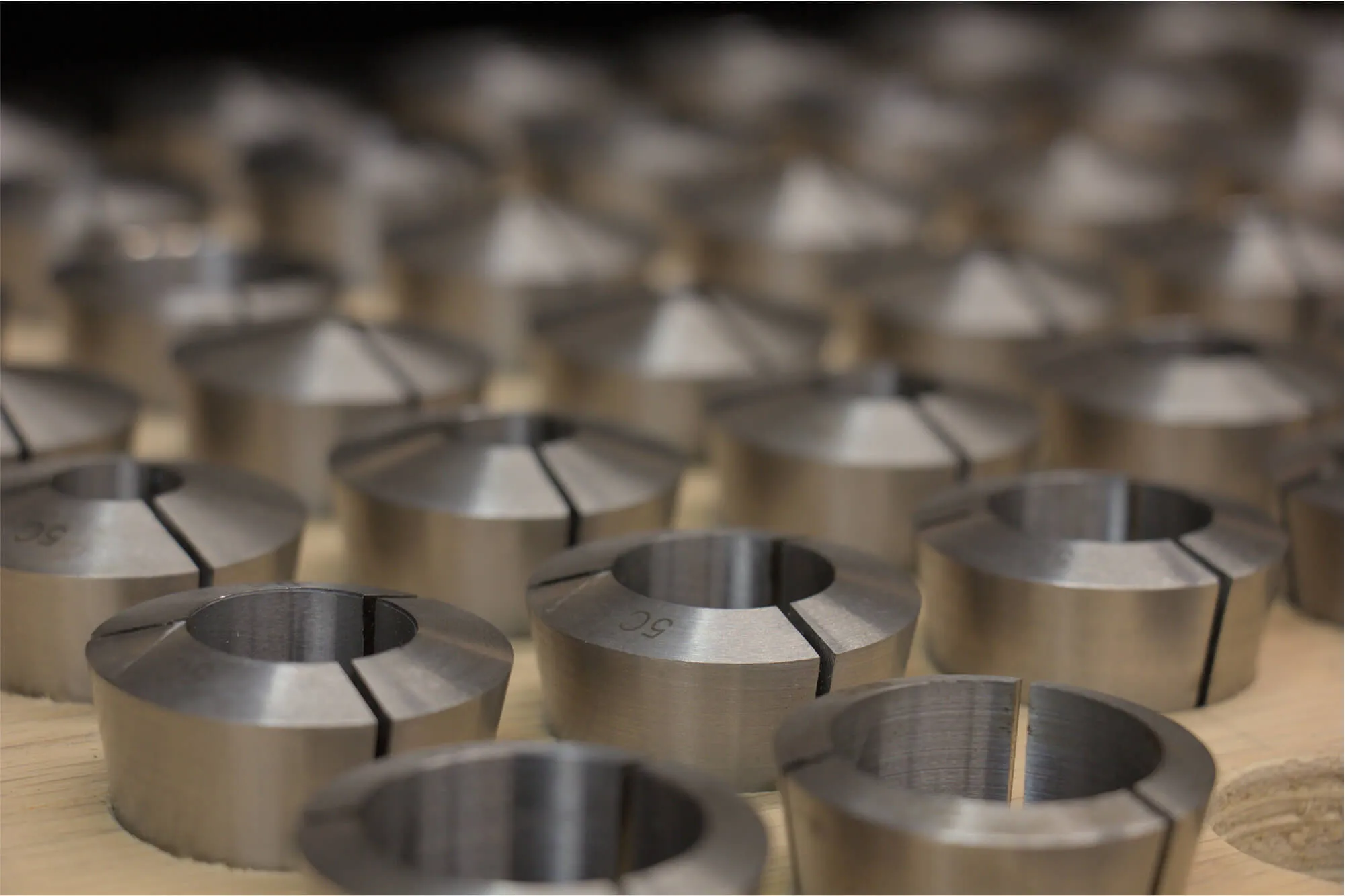 Organized storage of precision 5C collets, showcasing the detailed tooling inventory and commitment to accuracy required for high-quality machining and fabrication projects.