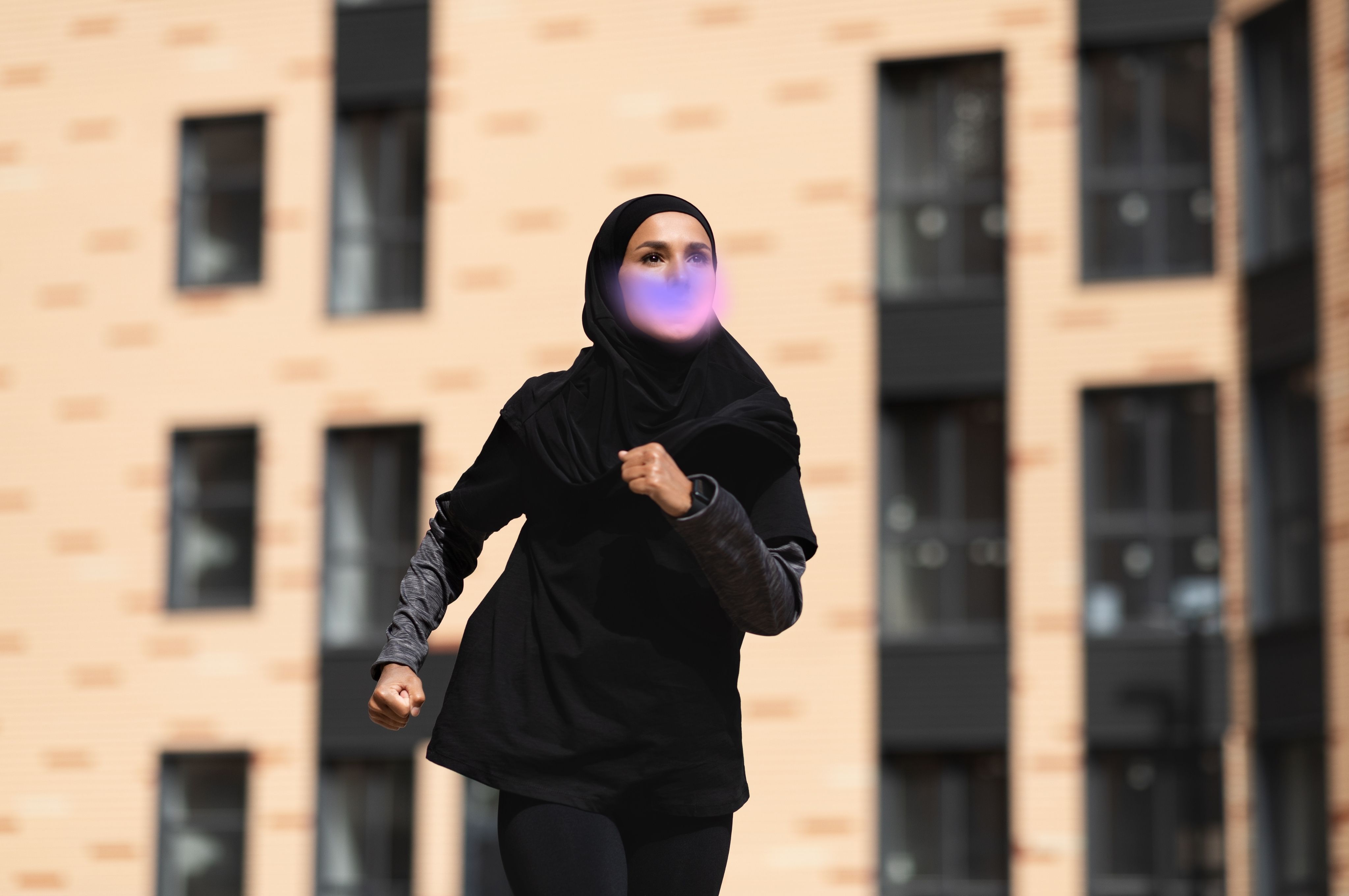 woman running and looking upward