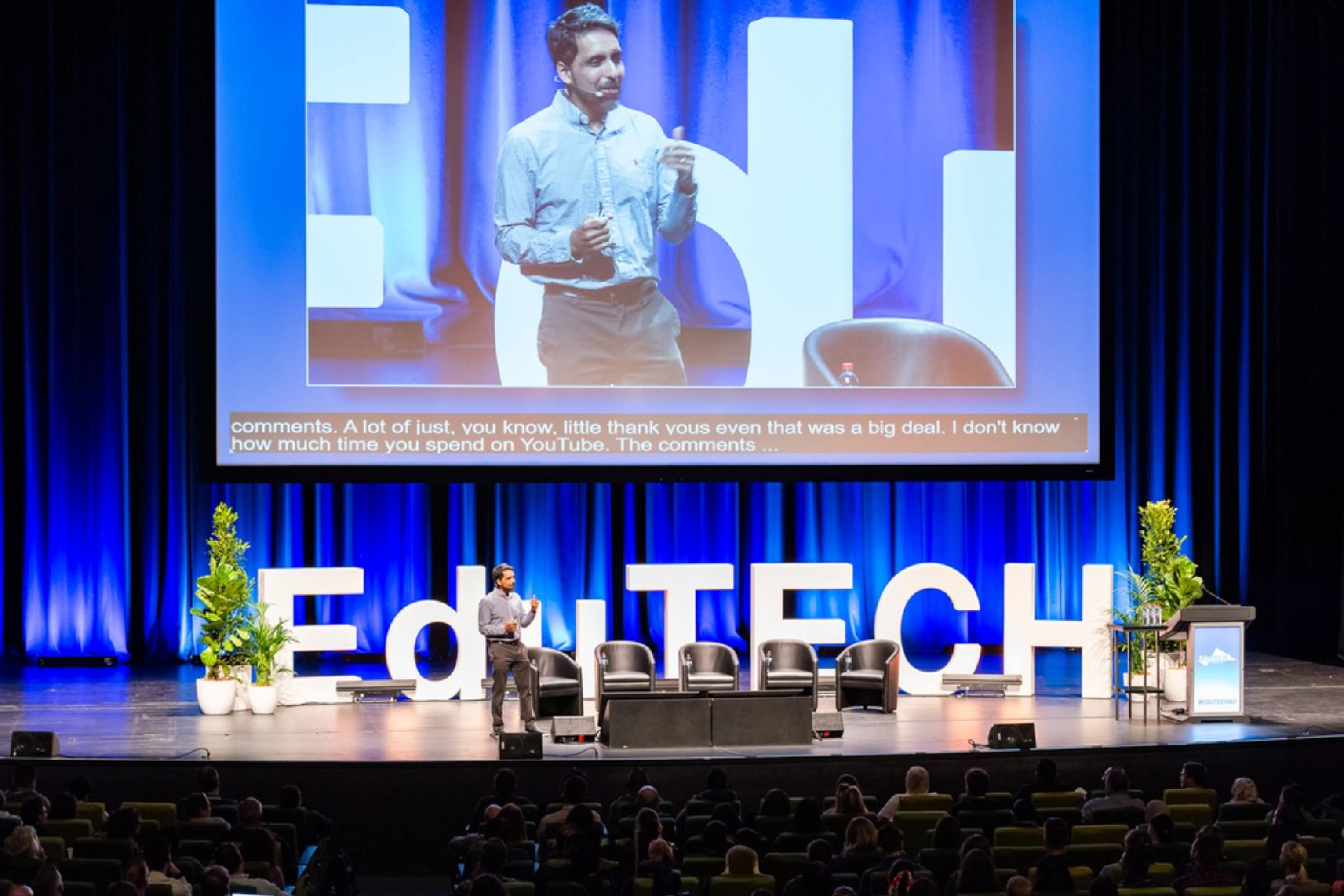 Speaker presenting on stage at EduTech 2024, where insights on navigating change in education were shared.
