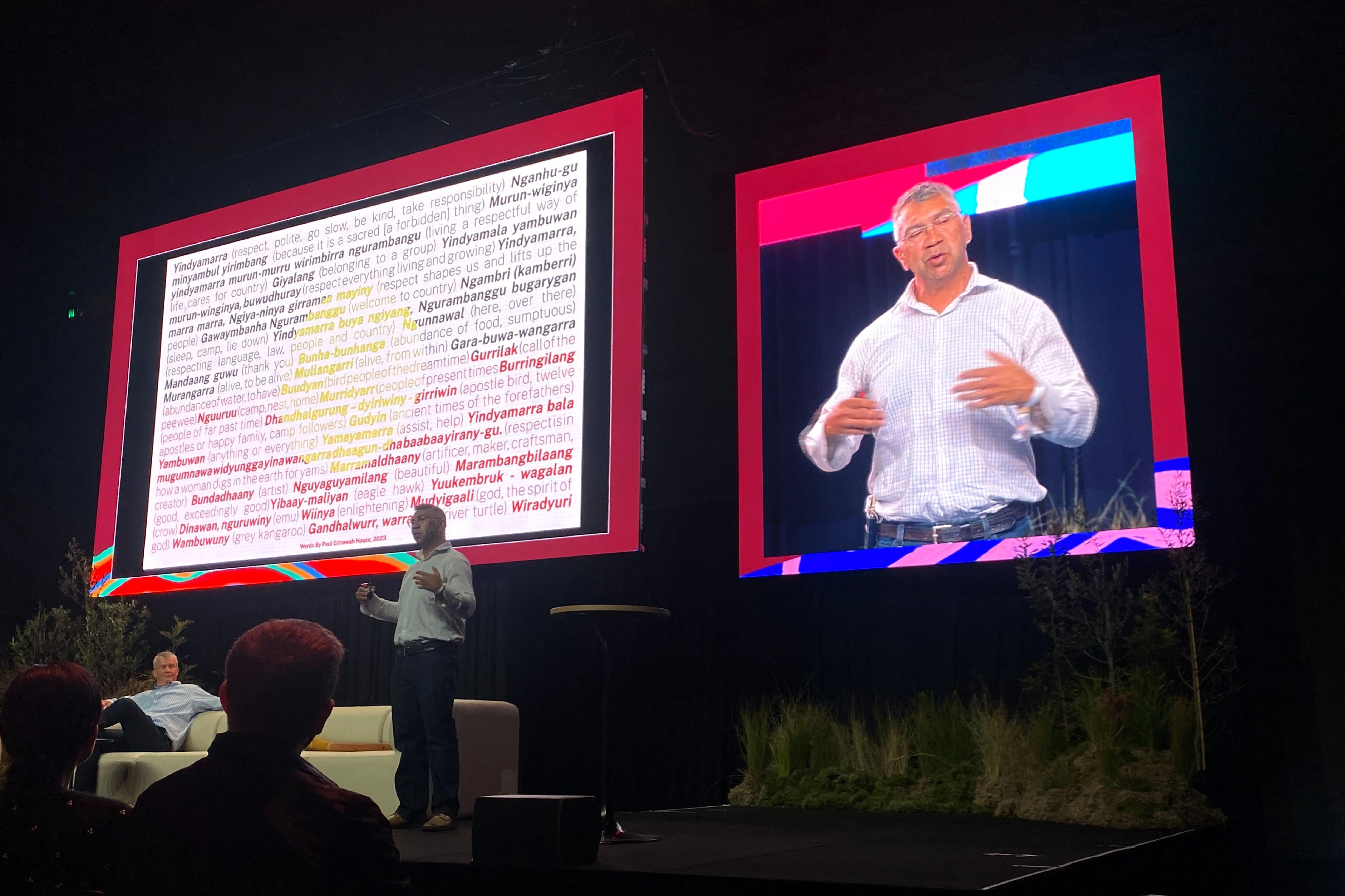 Presenter sharing Indigenous language concepts and cultural values at Purpose Conference 2023, emphasising respect, reciprocity and connection to Country.