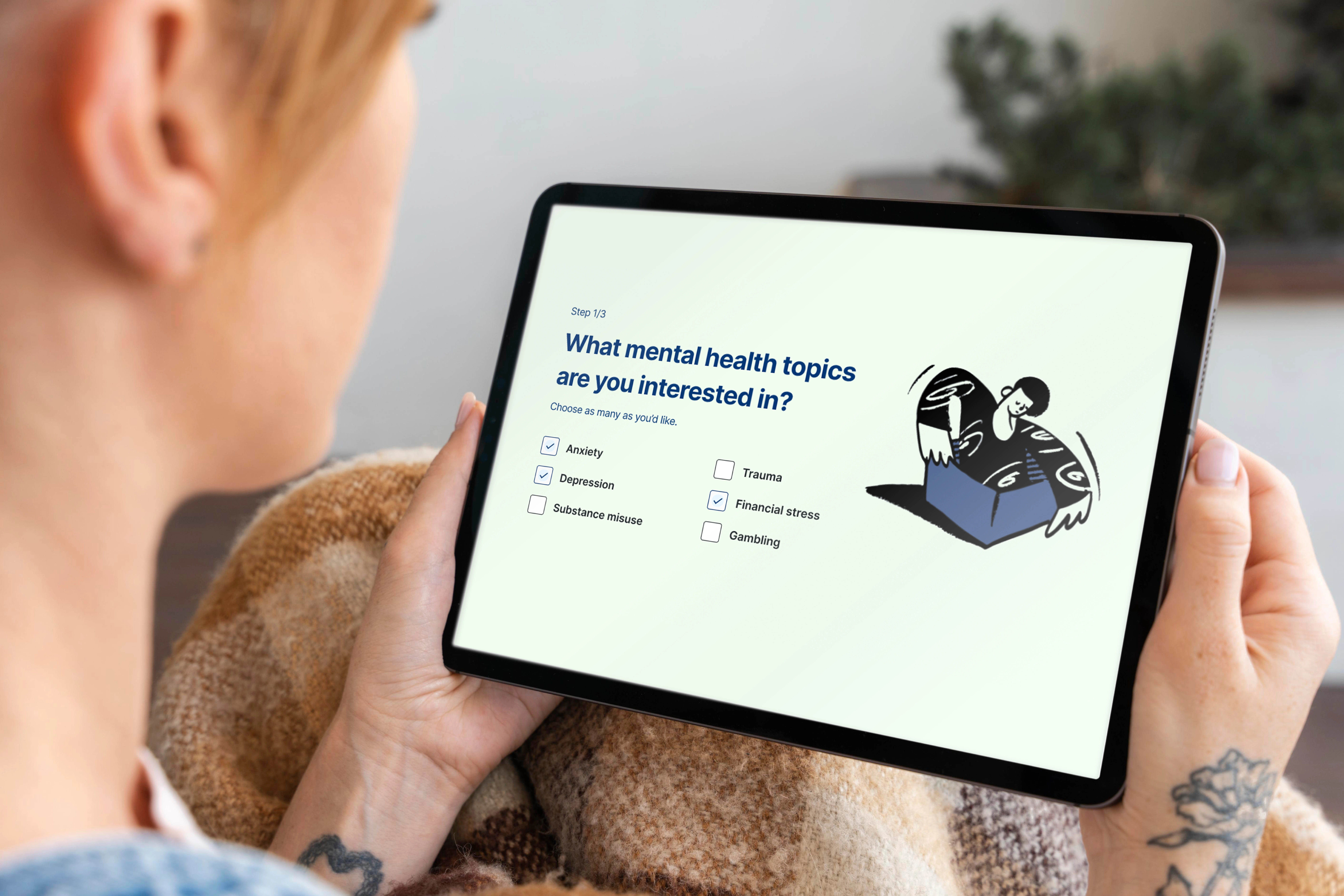 Hands holding a tablet displaying the Lifeline Support Toolkit interface, showing how users can access guided mental health support tools.