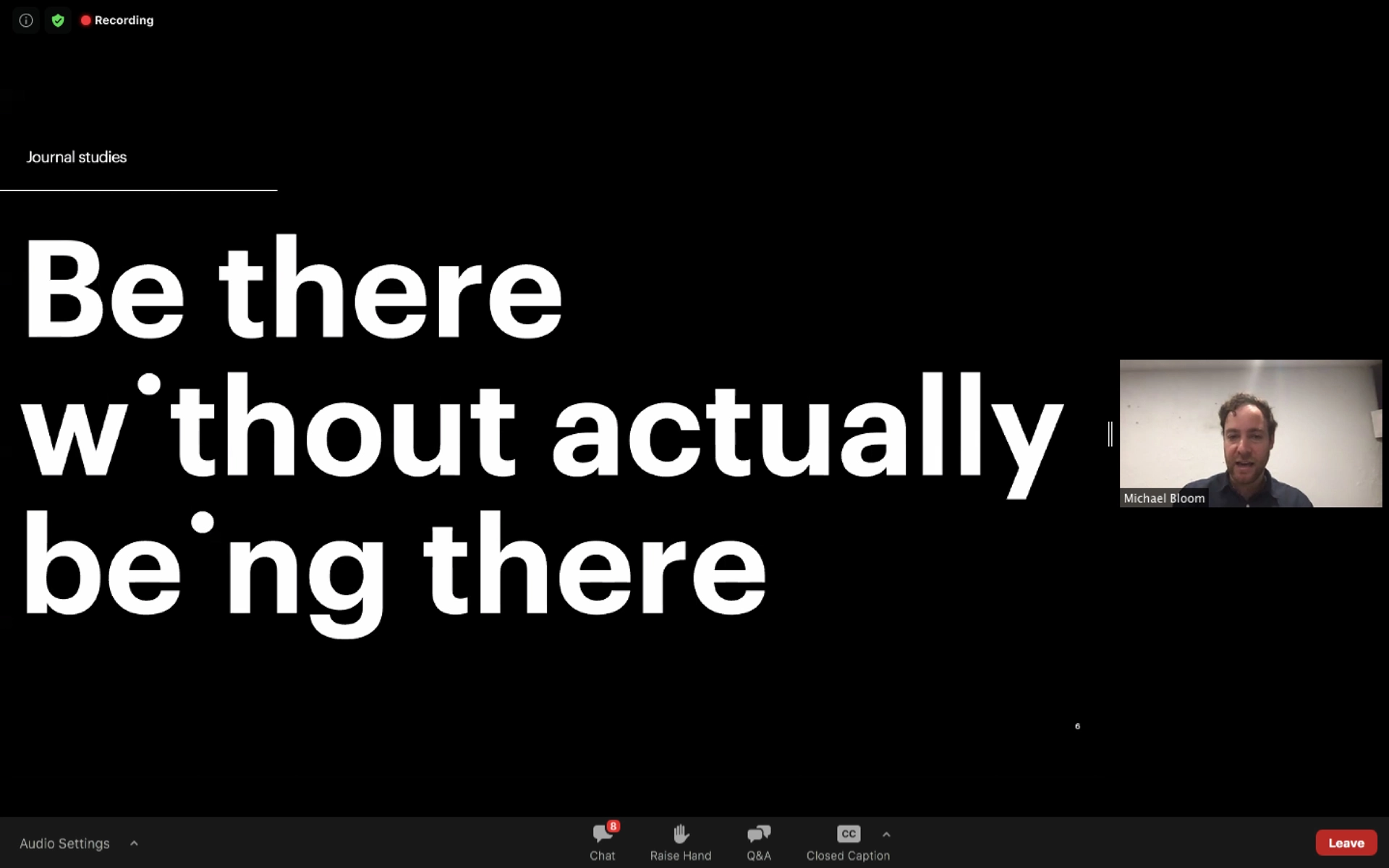 Zoom presentation slide reading ‘Be there without actually being there’ with a small video window showing the presenter.