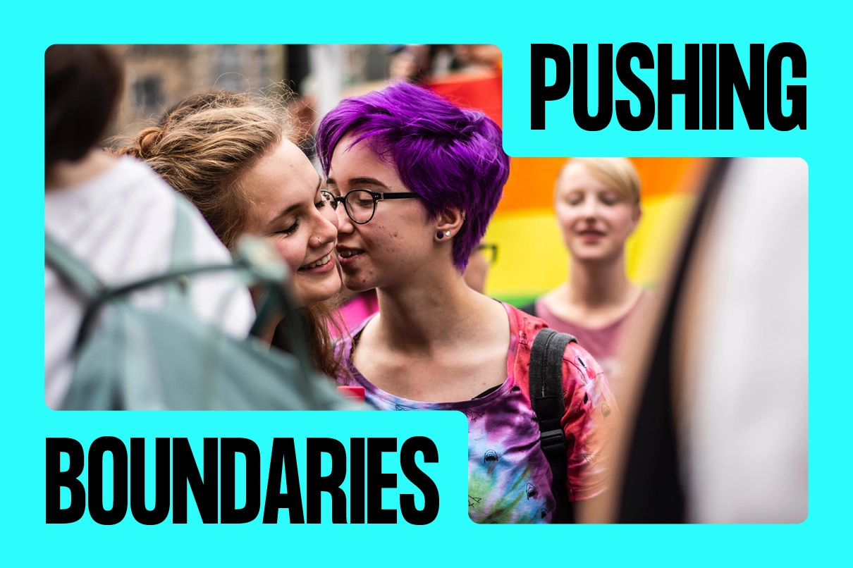 Young people at a pride event with the SANE campaign slogan “PUSHING BOUNDARIES” framing the image.