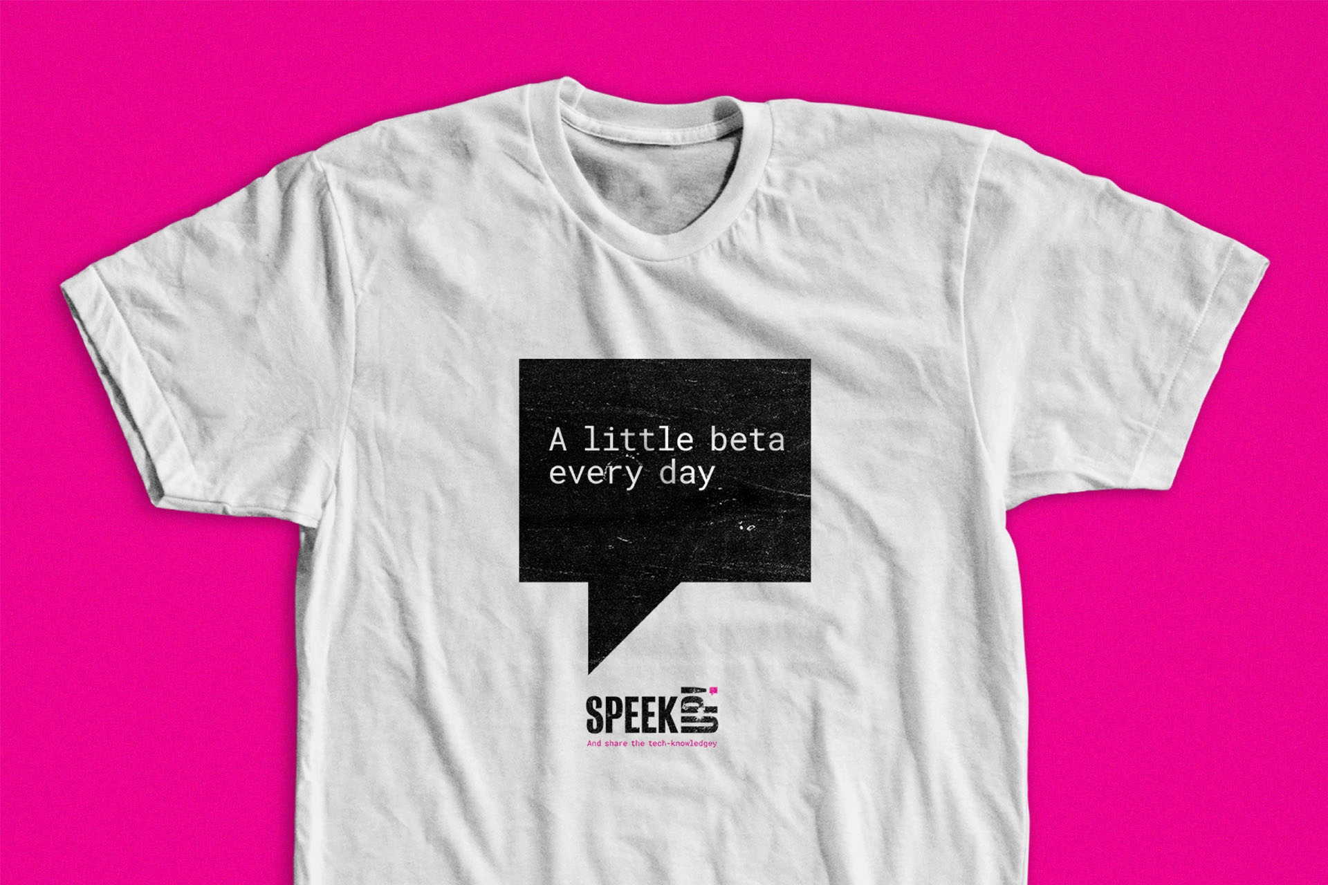 White SPEEK UP! T-shirt with speech bubble saying ‘A little beta every day’
