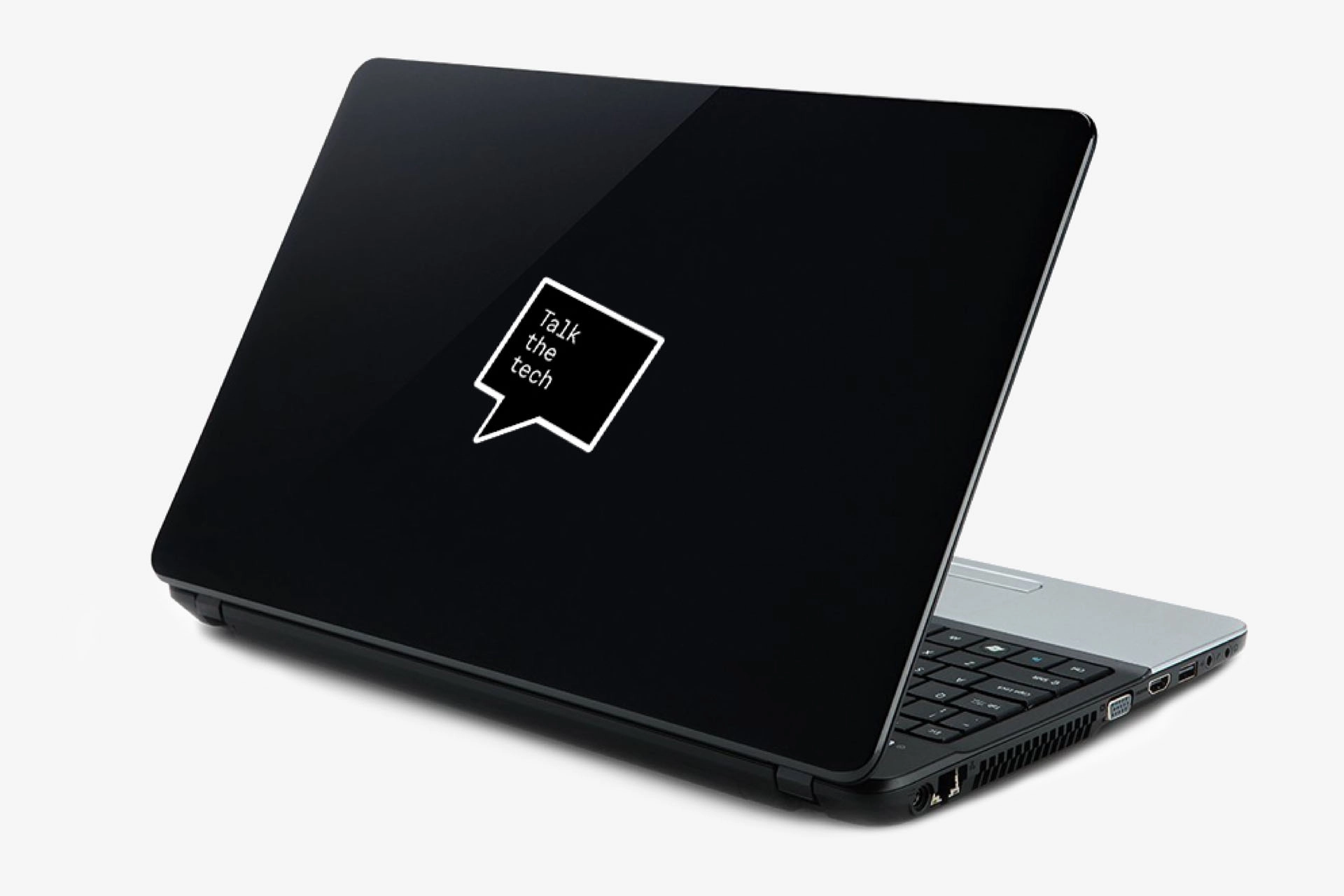 Laptop with SPEEK UP! sticker reading ‘Talk the tech’ in a speech bubble.