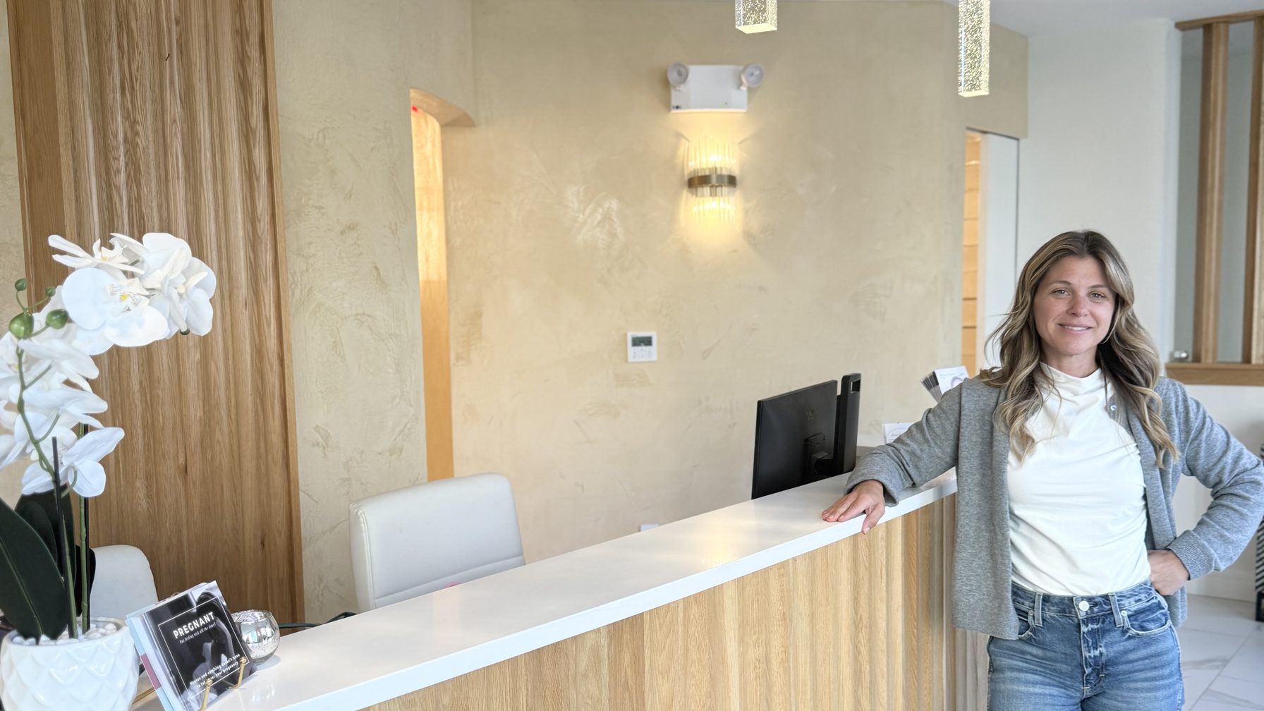 Materna Health co-founder Kristin Mallon at the front desk of the West Village office