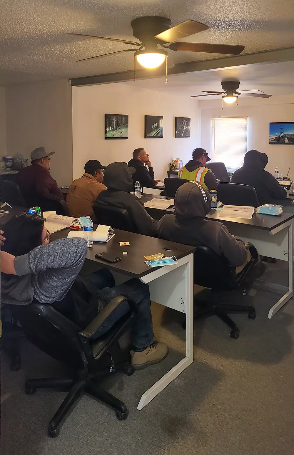 Group of crane operator students attending a classroom safety training session in Albuquerque.