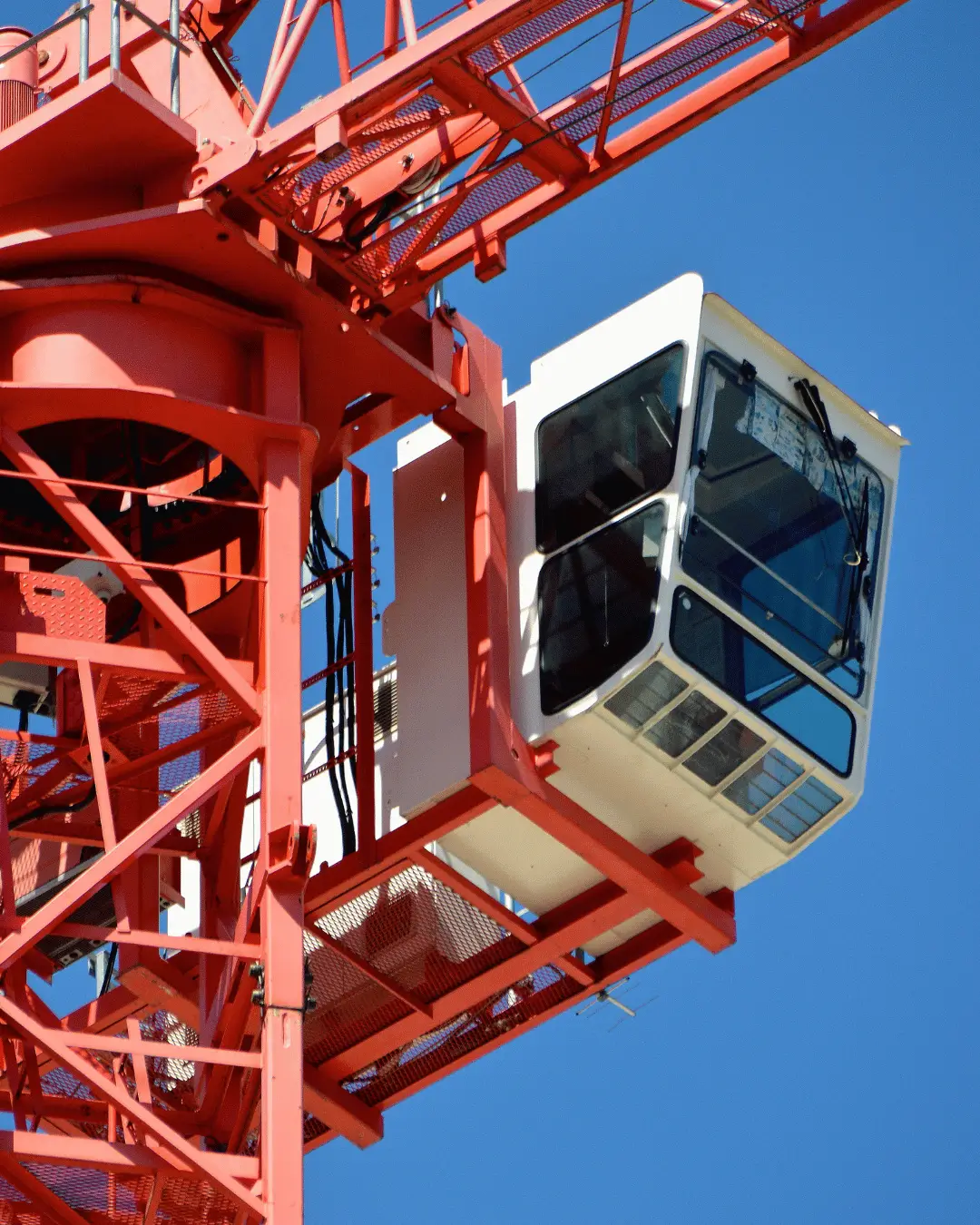 Close-up of a red tower crane cab