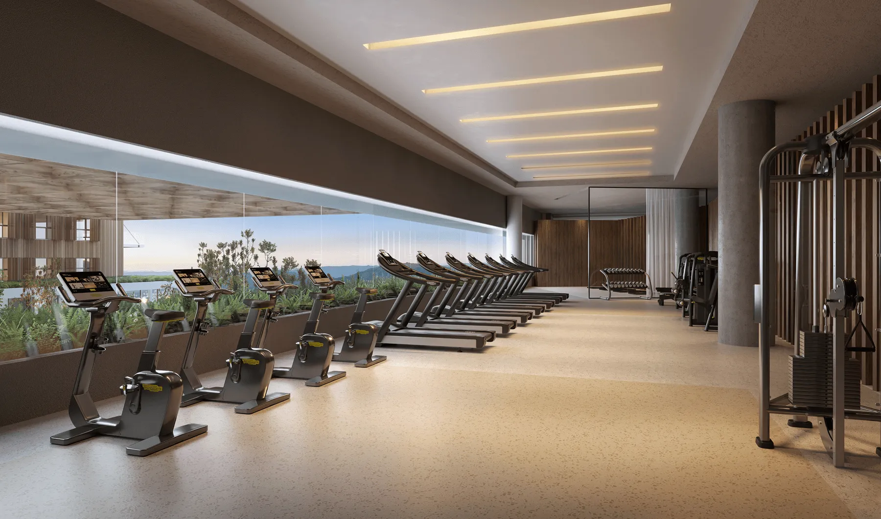 Academia moderna com bicicletas ergométricas, esteiras alinhadas perto de uma janela panorâmica e equipamentos de musculação ao fundo.