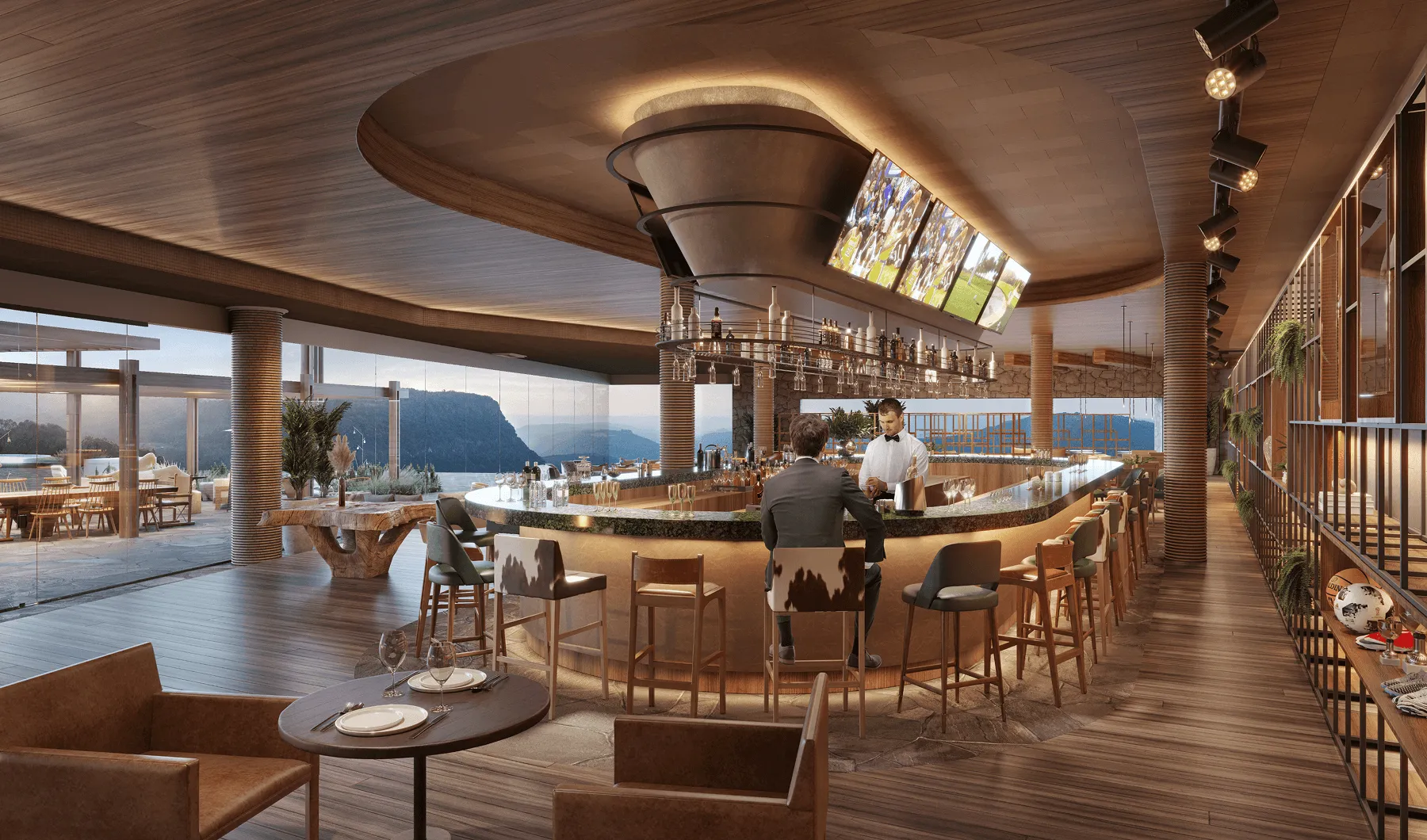 Bar moderno com assentos altos ao redor do balcão, garçom servindo cliente e vista panorâmica de montanhas através de paredes de vidro.