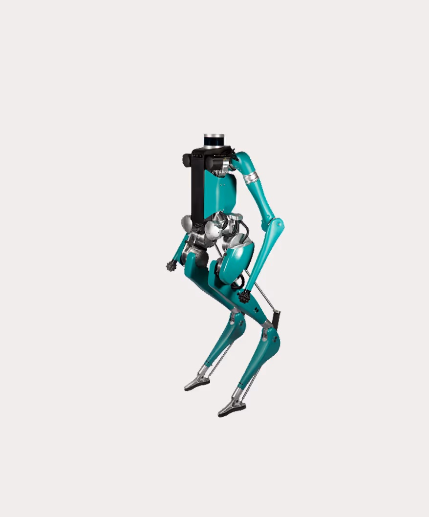 Green and black humanoid robot with articulated limbs in a crouching position on a light background.