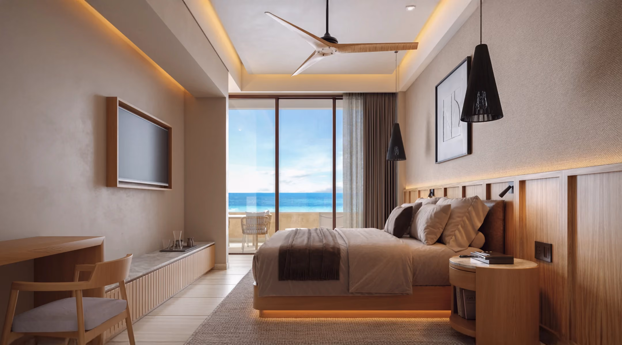 Modern bedroom with a king-size bed featuring wooden paneling and soft beige bedding, a designer ceiling fan, pendant lights, and a balcony with ocean view through sliding glass doors.