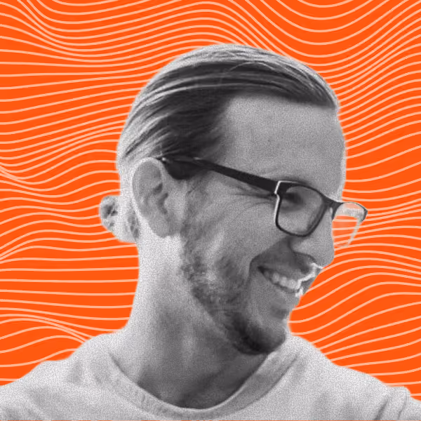 Headshot of Quinn Bell, creative director and co-founder of Fireside.