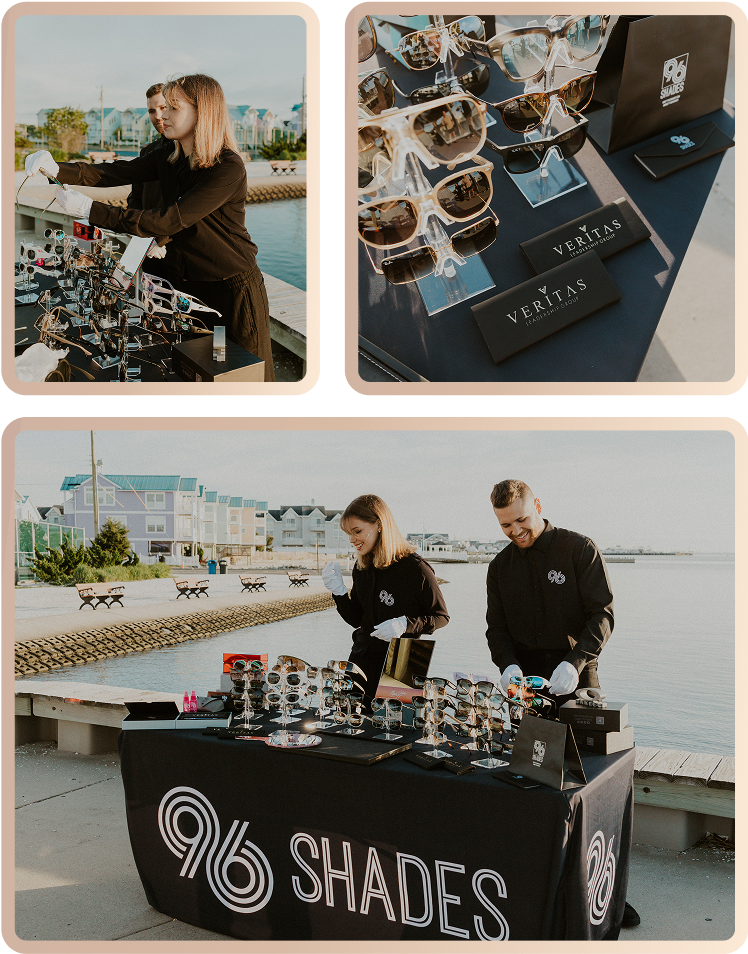 Outdoor gifting event by the water featuring a sunglasses display table with branded packaging. Team members interact with guests and showcase luxury eyewear, including name brand sunglasses