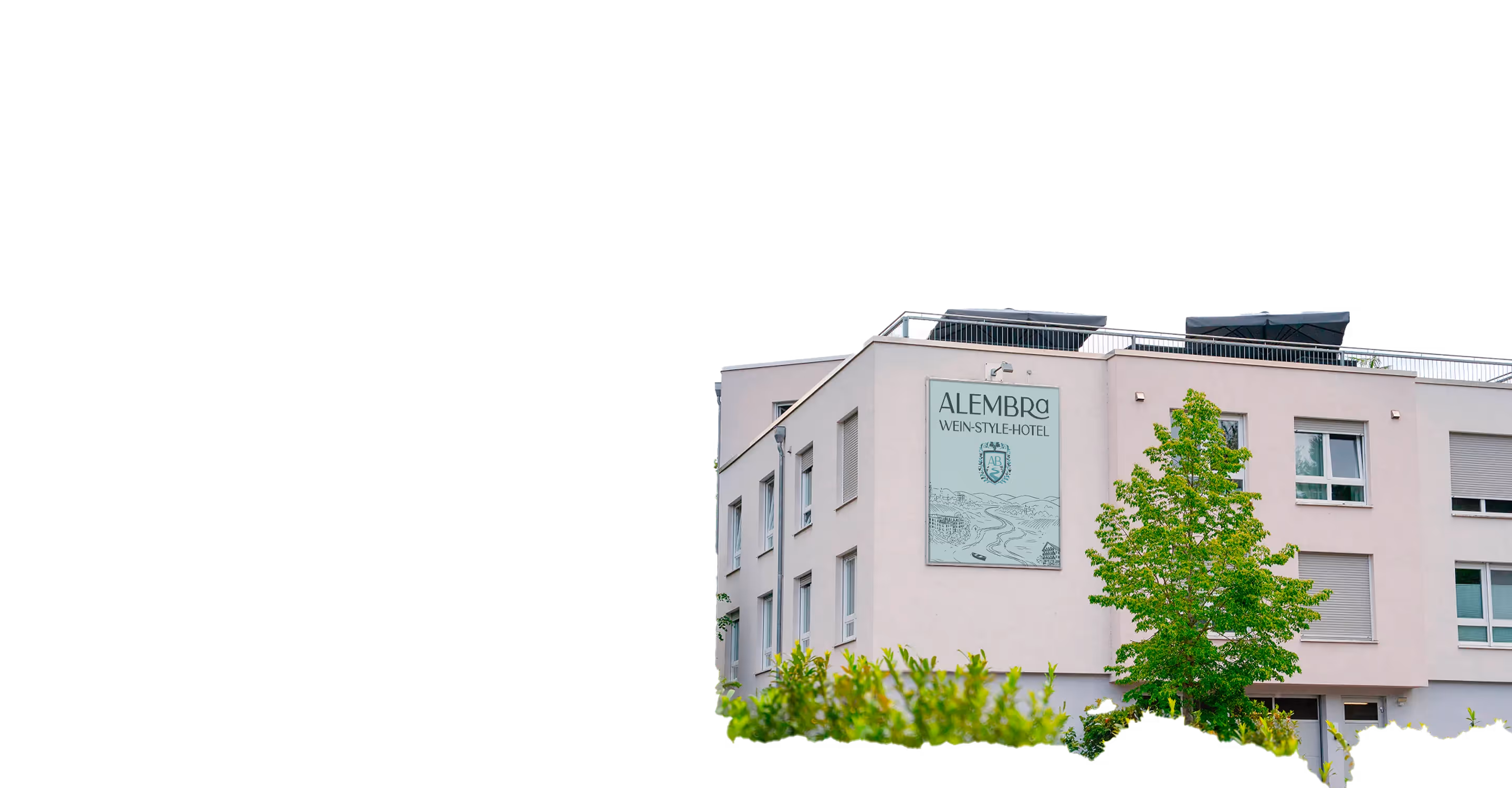 Modern beige building with a large sign reading 'ALEMBRA WEIN-STYLE-HOTEL' and green trees in front.
