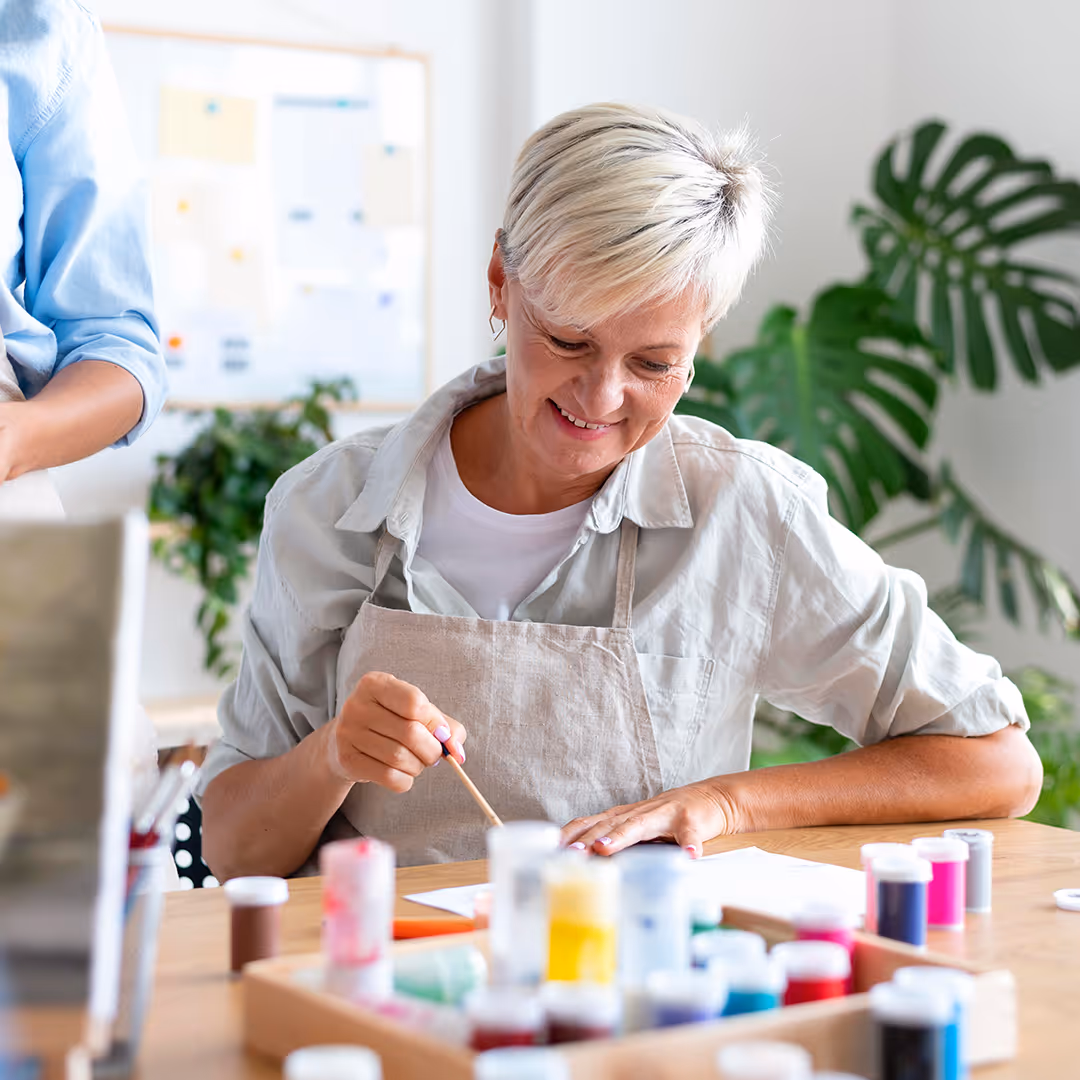 Woman painting. How Art Therapy in Houston Can Help You Heal. Cactus Counseling & Art Therapy in Houston TX.
