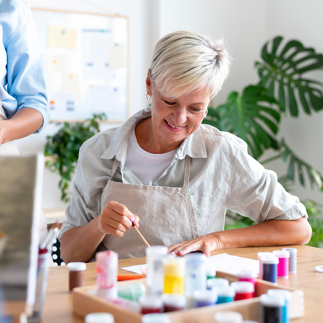 Woman painting. How Art Therapy in Houston Can Help You Heal. Cactus Counseling & Art Therapy in Houston TX.