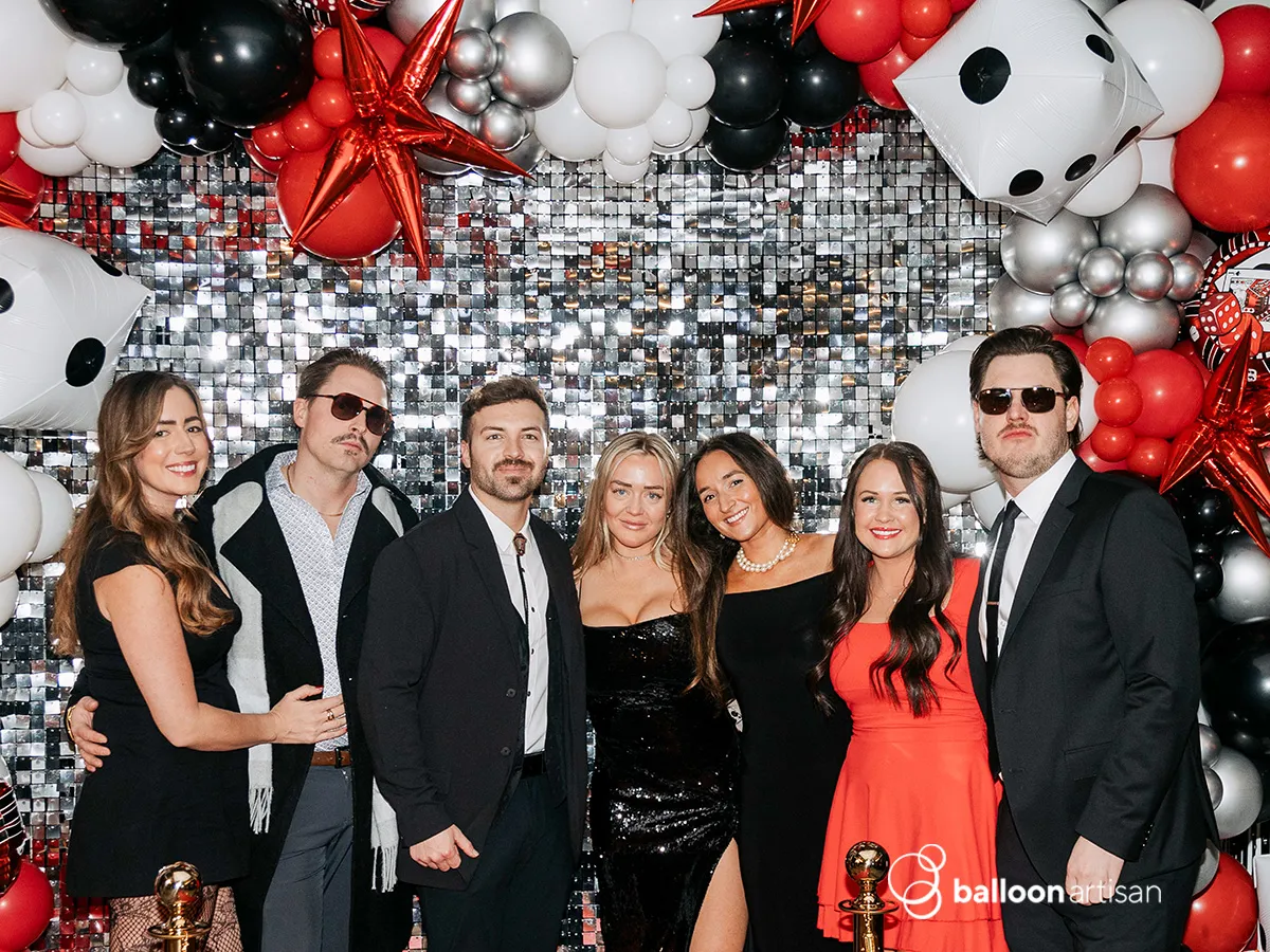 A balloon arch for a grand opening ribbon cutting ceremony for a brand launch.