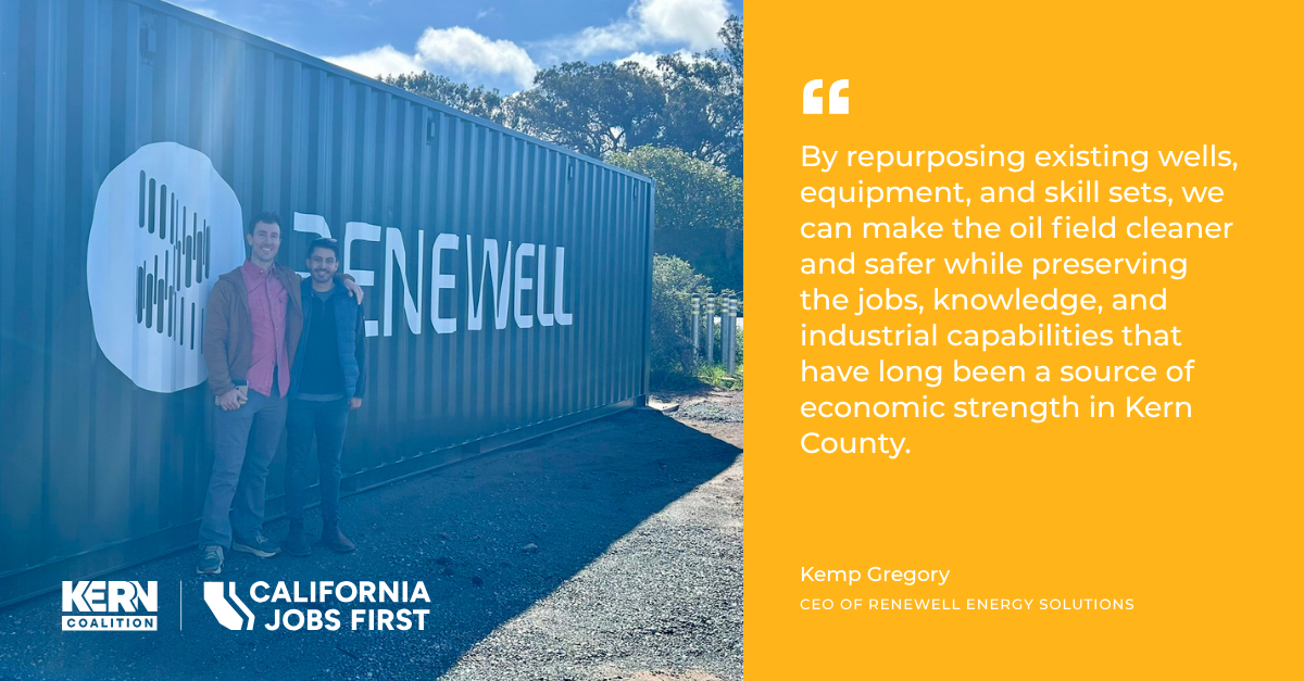 Two men standing in front of a large metal container with a Renewell logo