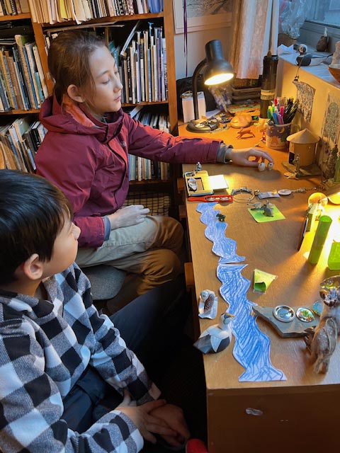 Grandchildren at work desk