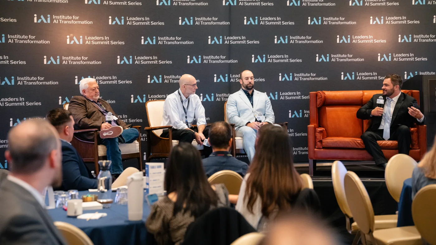 Executive panel in conversation with attendees at the Leaders in AI Summit in Dallas