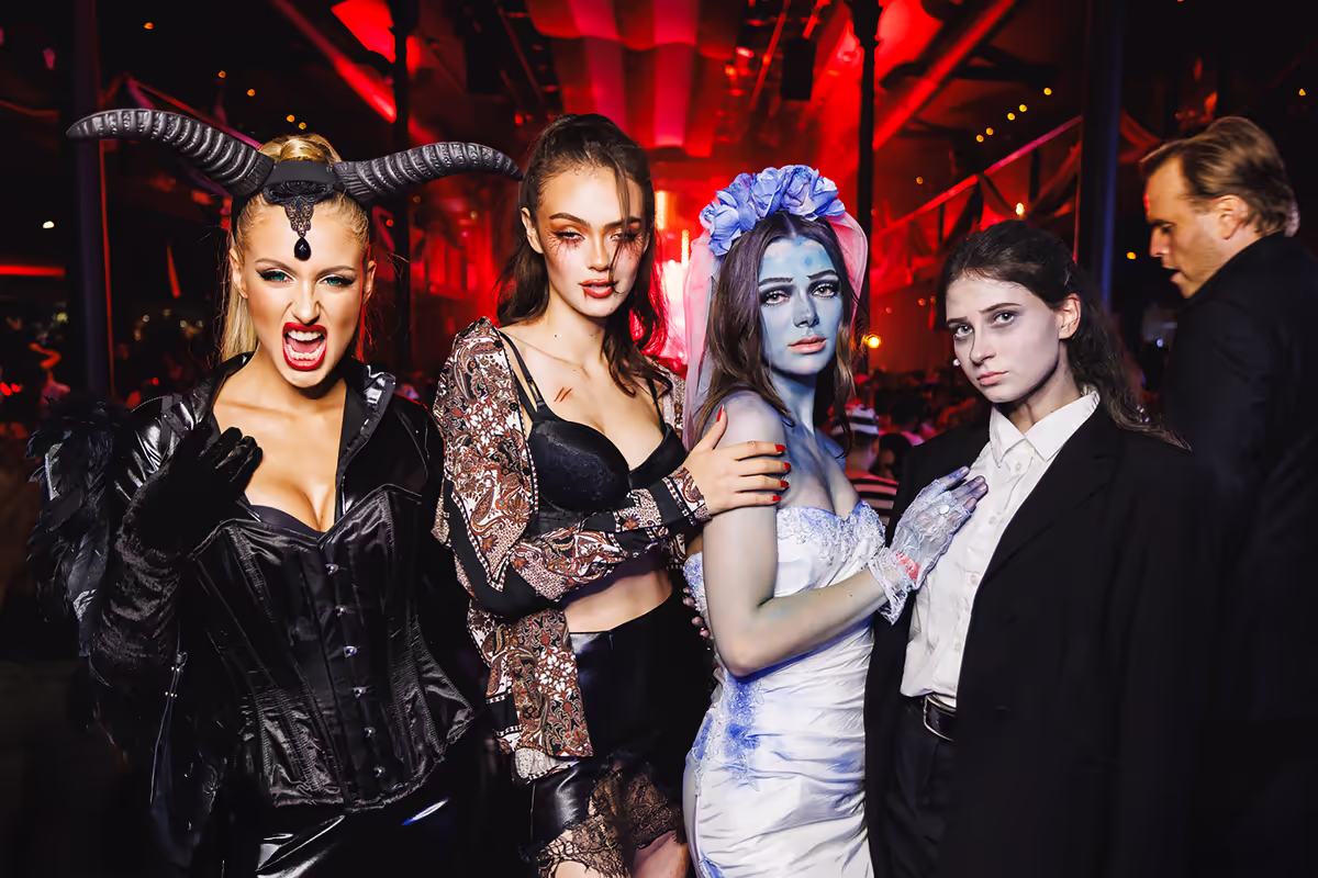 A group of people dressed in Halloween costumes