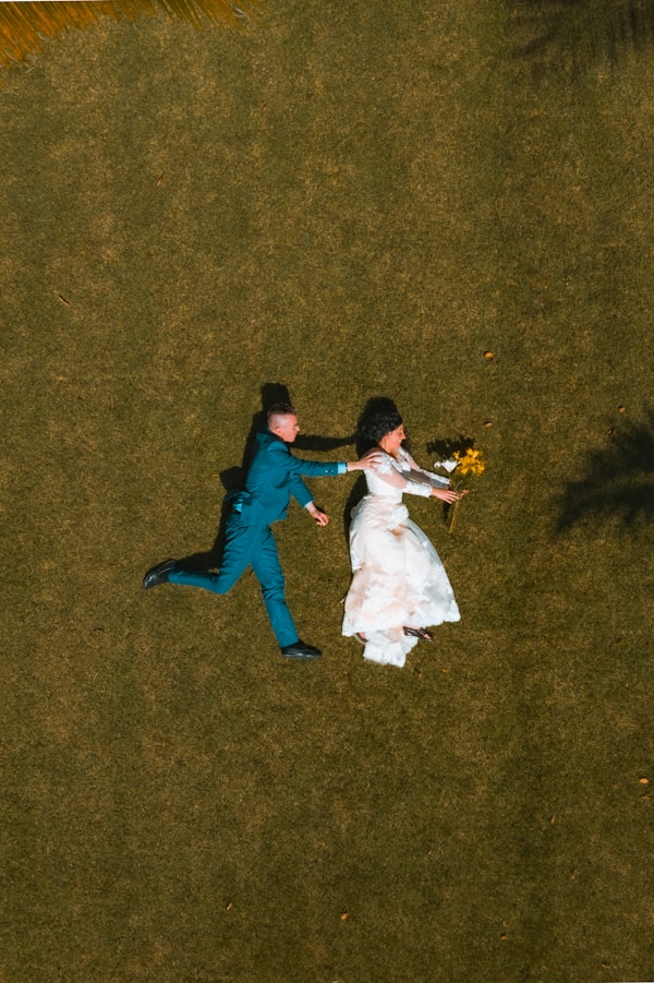portrait of a bride running away from the groom