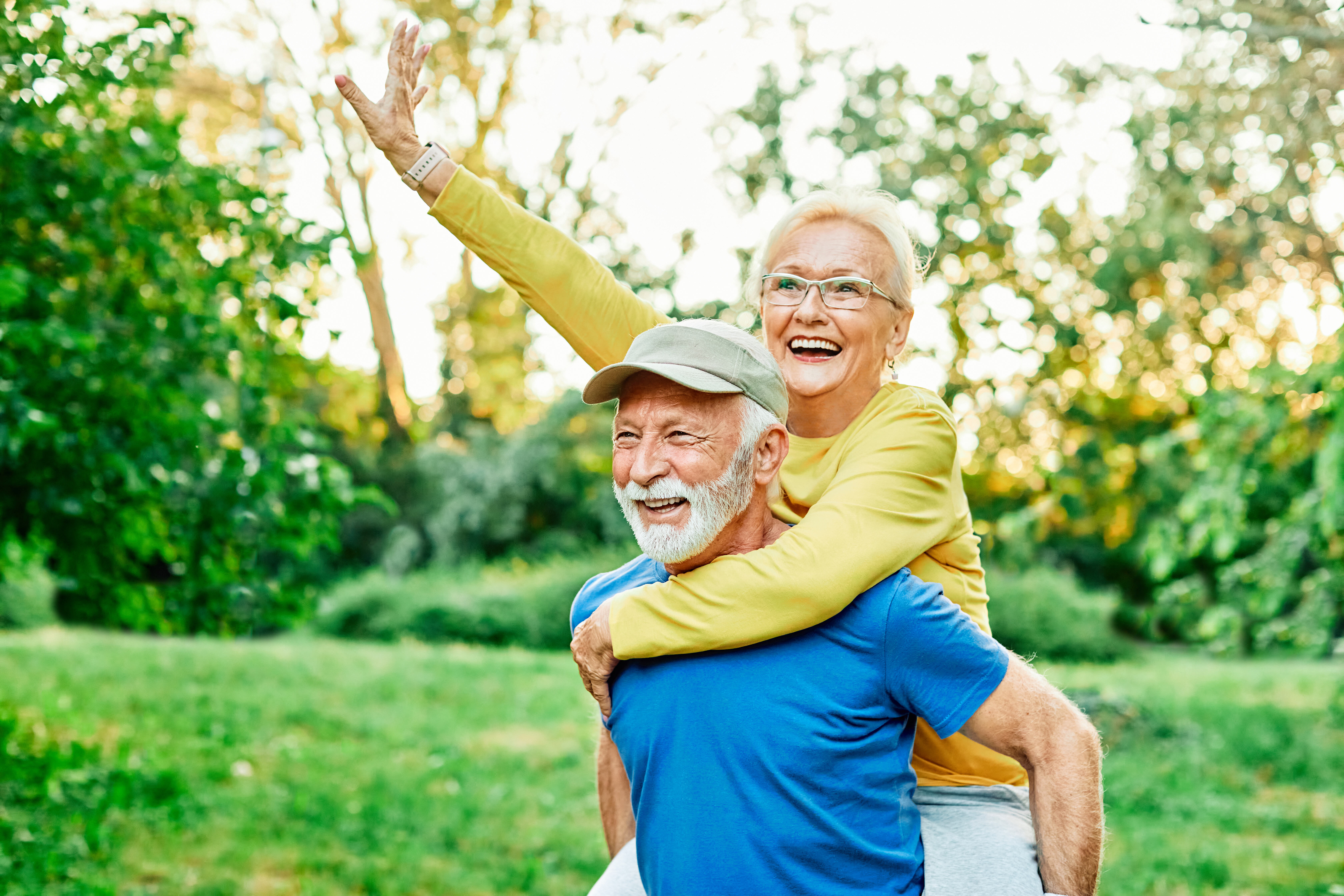 seniors doing piggy back ride stock image