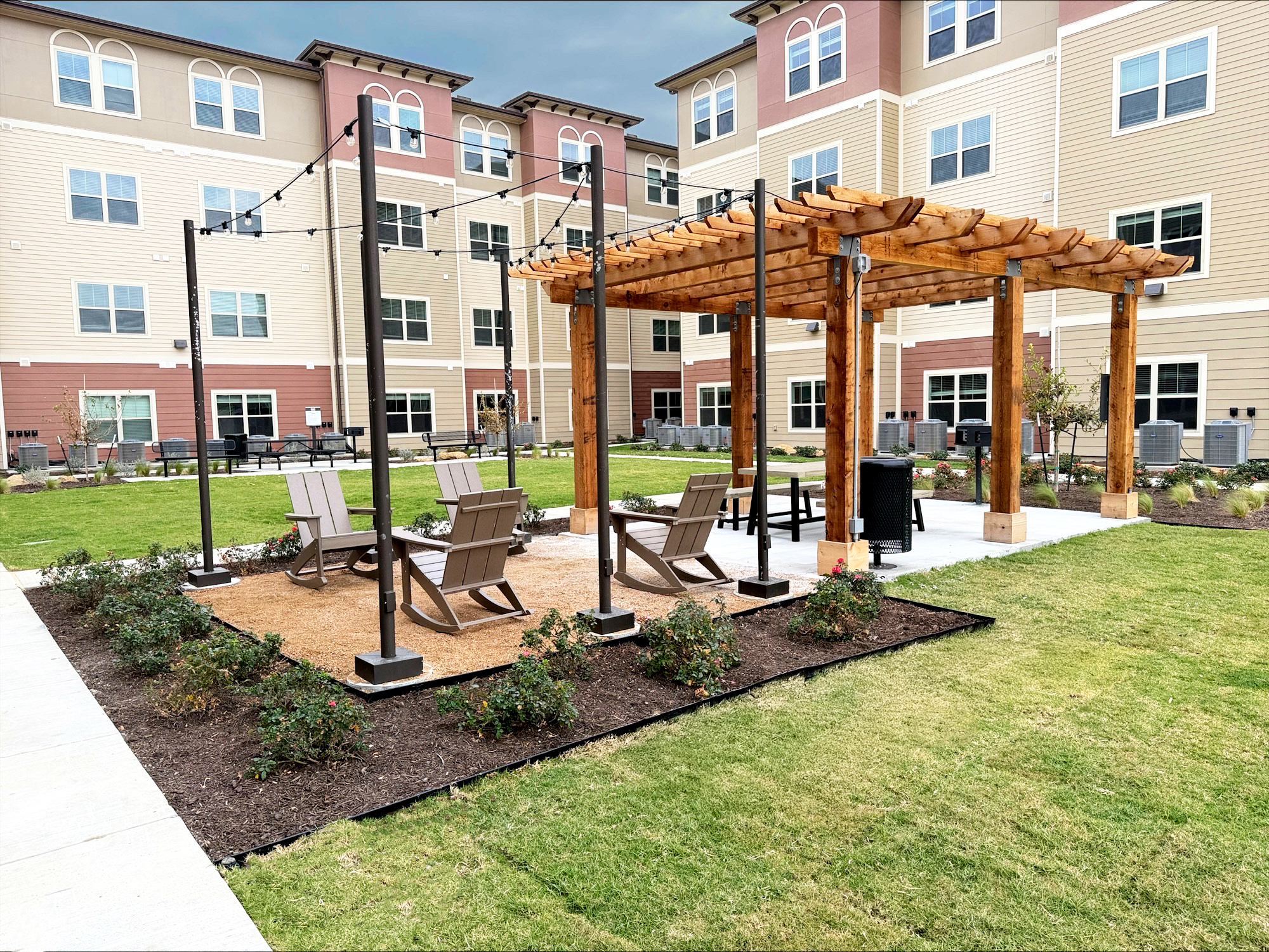 Courtyard with cabana and lounge chairs