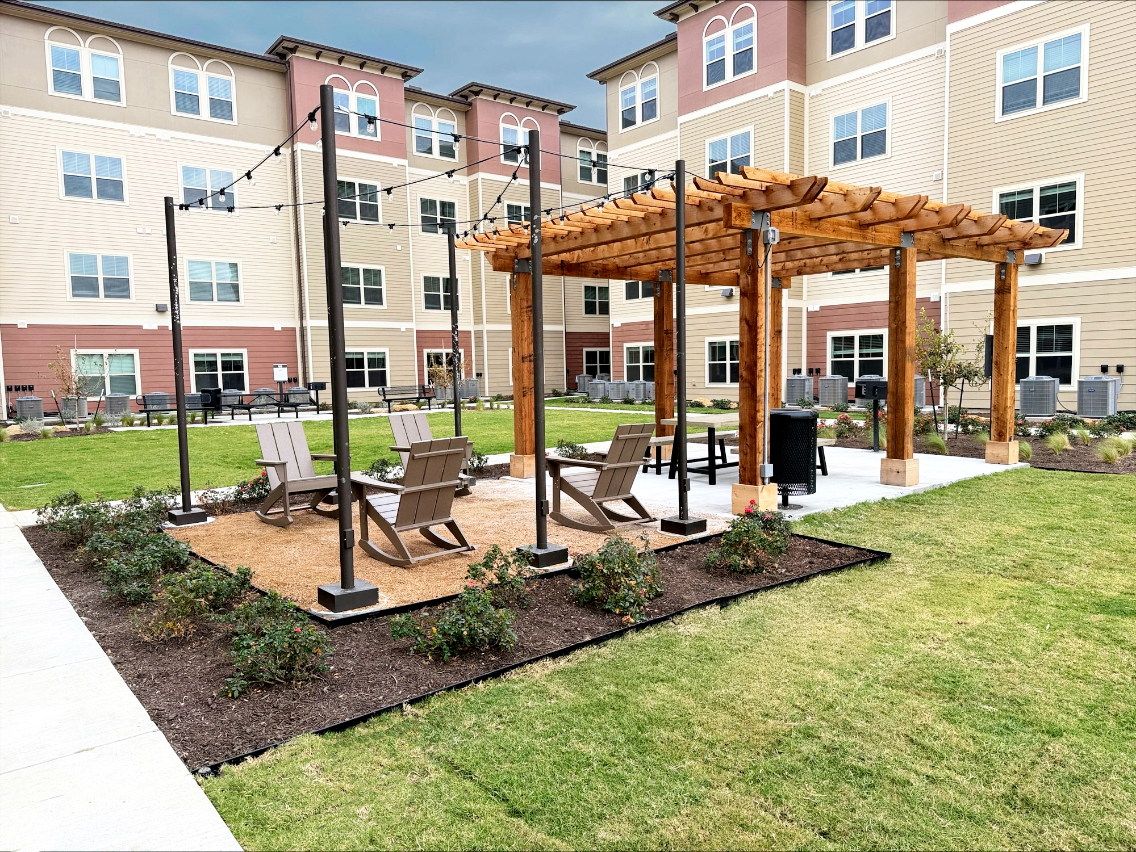 Courtyard with cabana and lounge chairs
