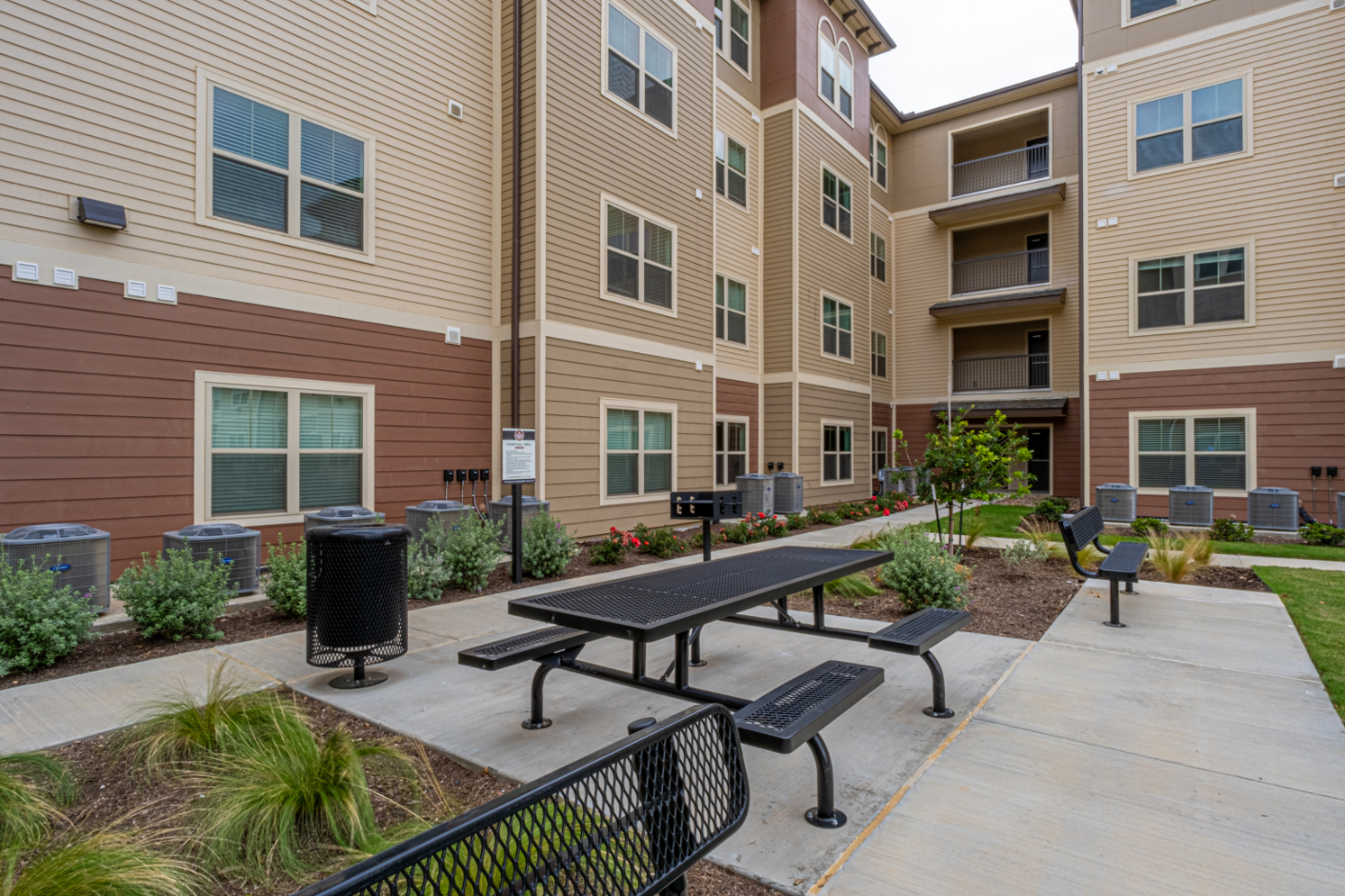 Picnic area with tables and grills