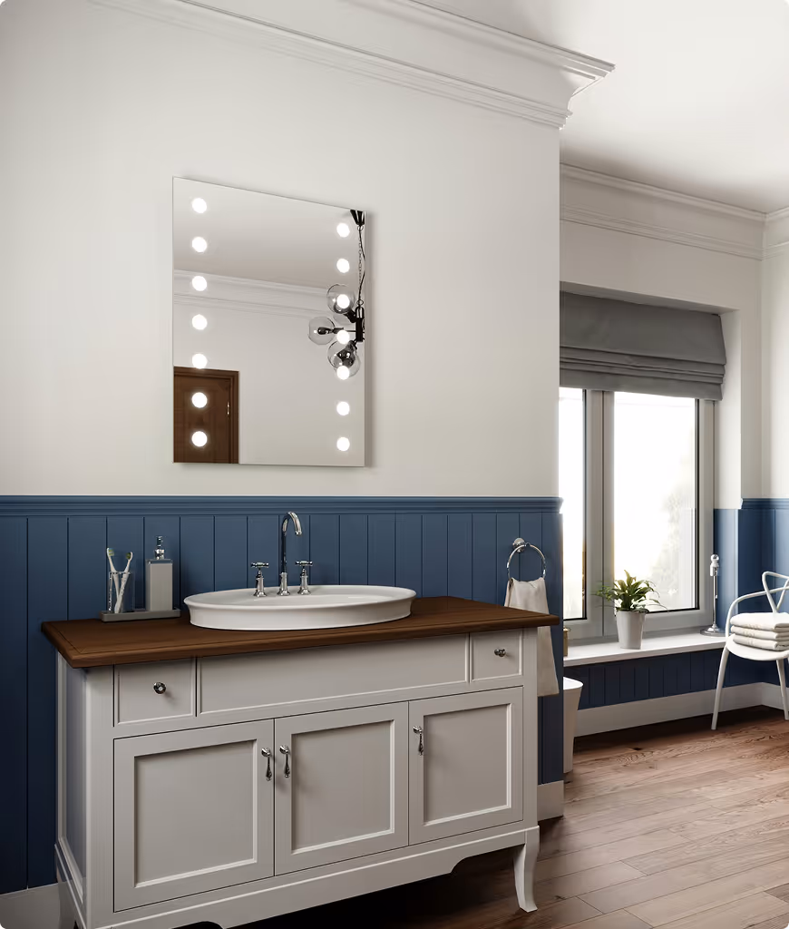 A bathroom with a vanity and blue walls.