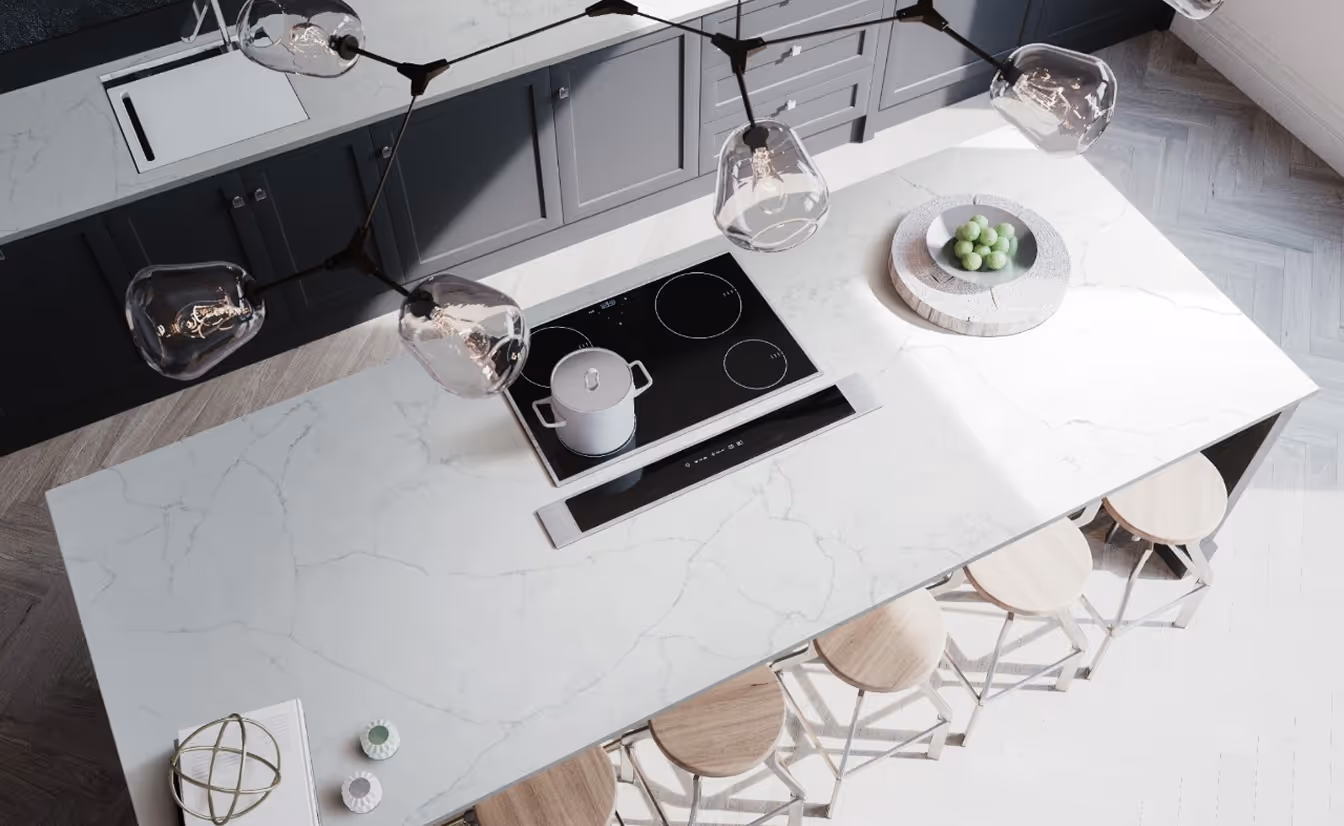 A kitchen with a stove top oven and a marble counter top.