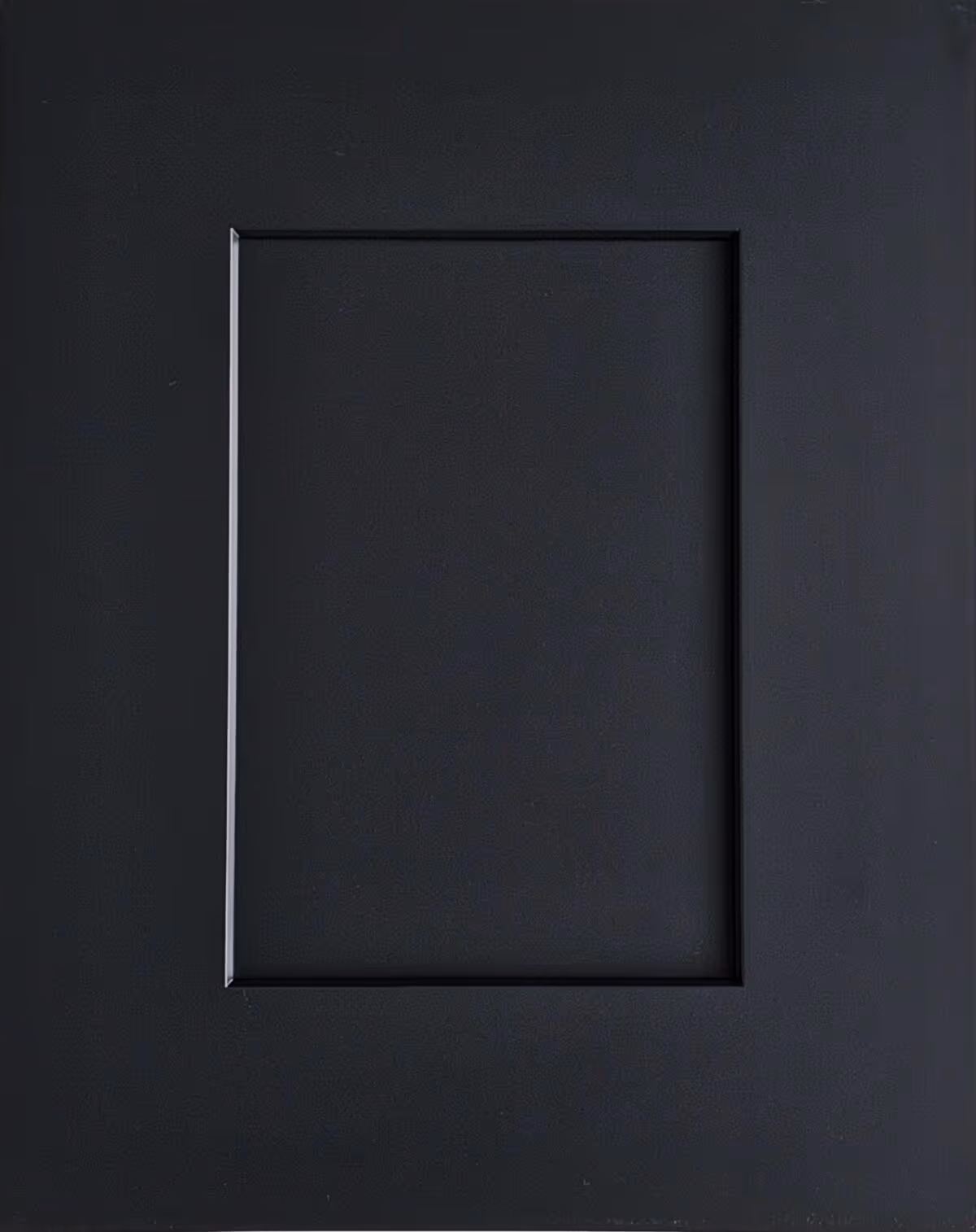 A spacious kitchen featuring a large island with a marble countertop, dark wooden cabinets, and a gas range. Natural light enters through a window, illuminating the room's modern appliances and neutral color scheme.