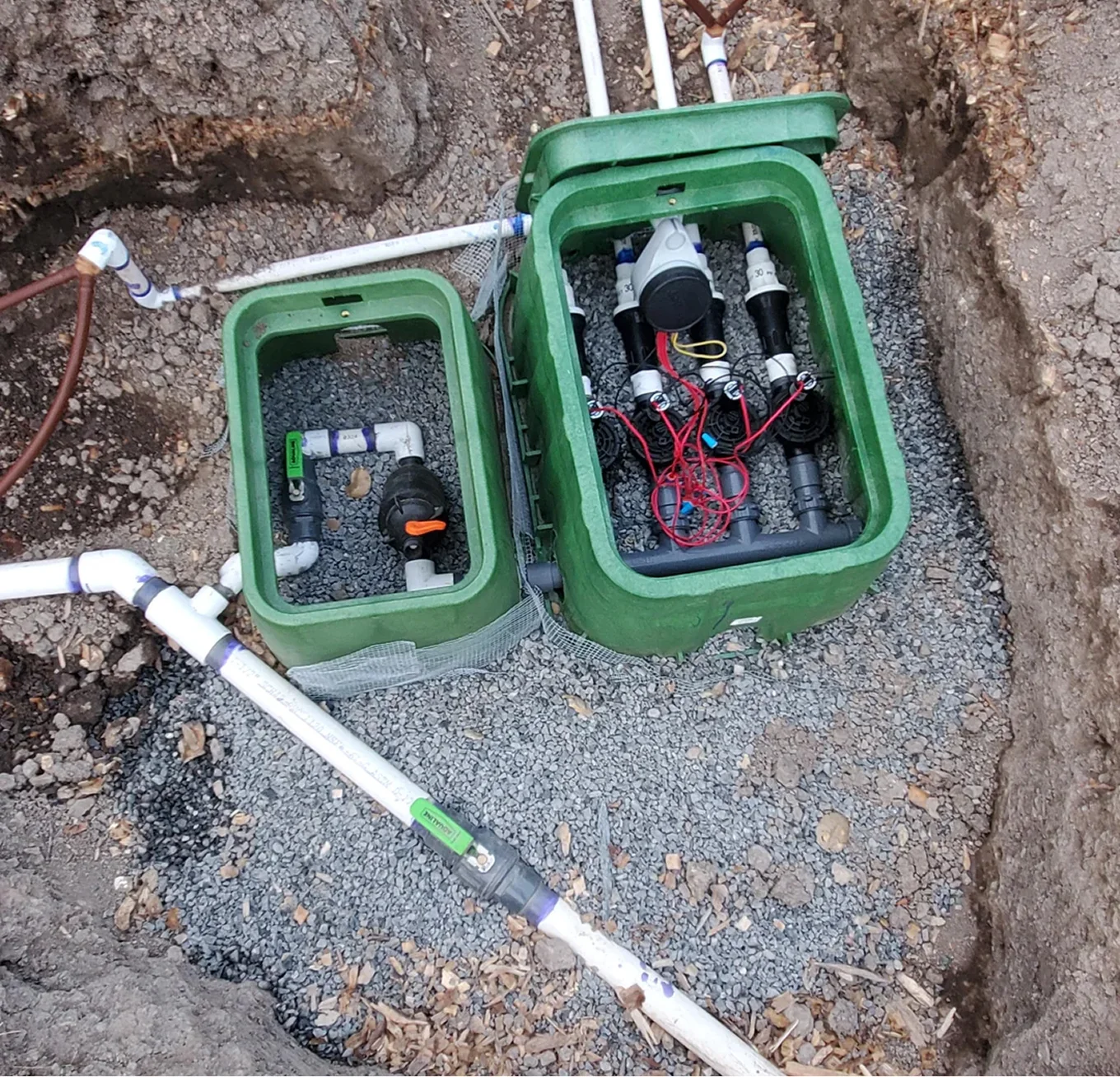 green irrigation valve boxes pvc pipes wiring