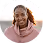 Smiling woman with curly hair wearing a pink scarf outdoors.