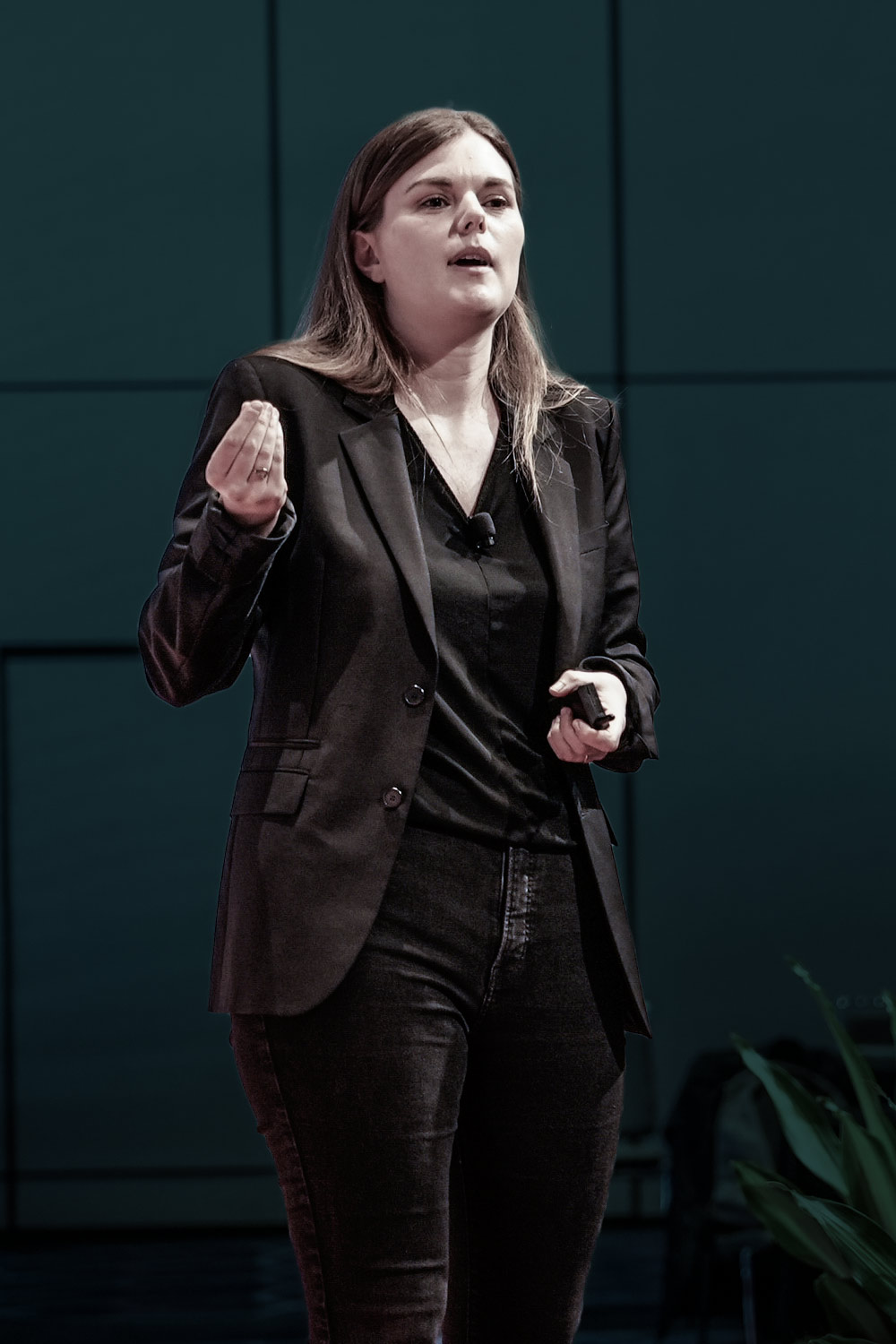 Lucy blair chung speaking at a conference event