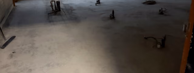 Prepared concrete floor after glue removal and diamond grinding at a school in Windsor NSW