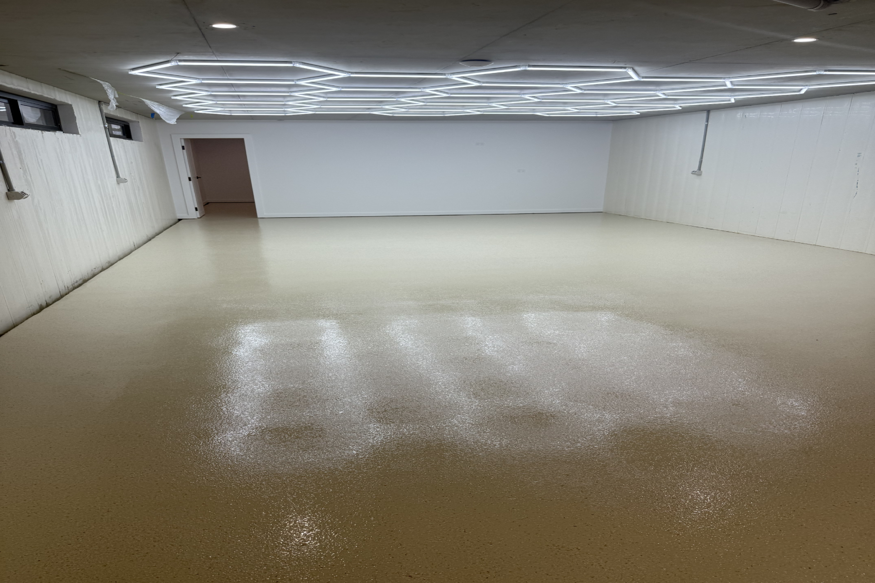 Completed Eggshell epoxy flake basement flooring at a duplex development in Merrylands