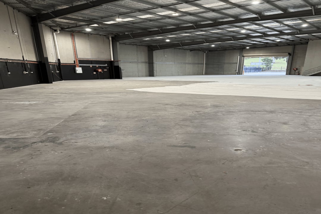 Mechanically profiled warehouse concrete after large-area grinding in Campbelltown NSW