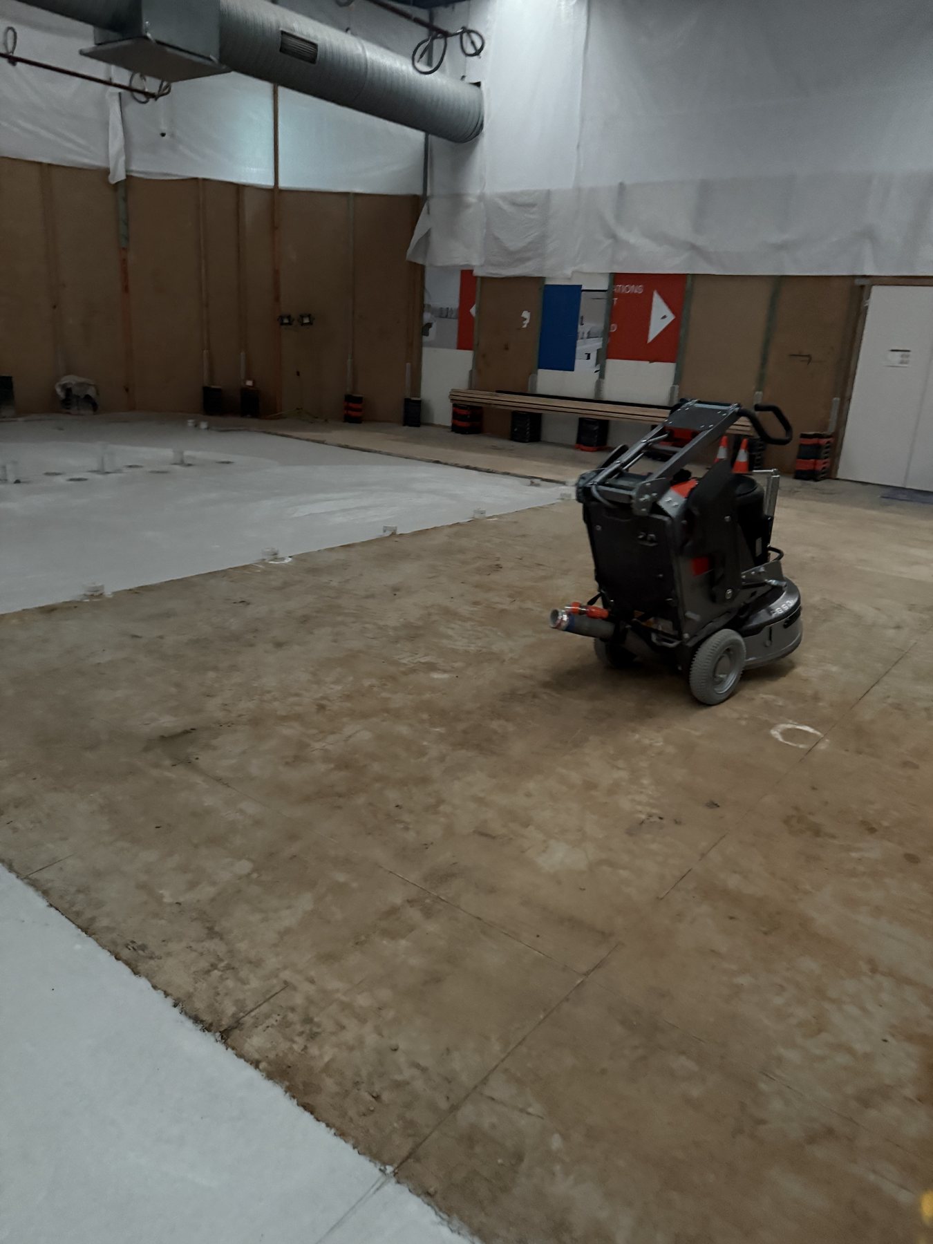 Initial diamond grinding across the new retail tenancy concrete floor