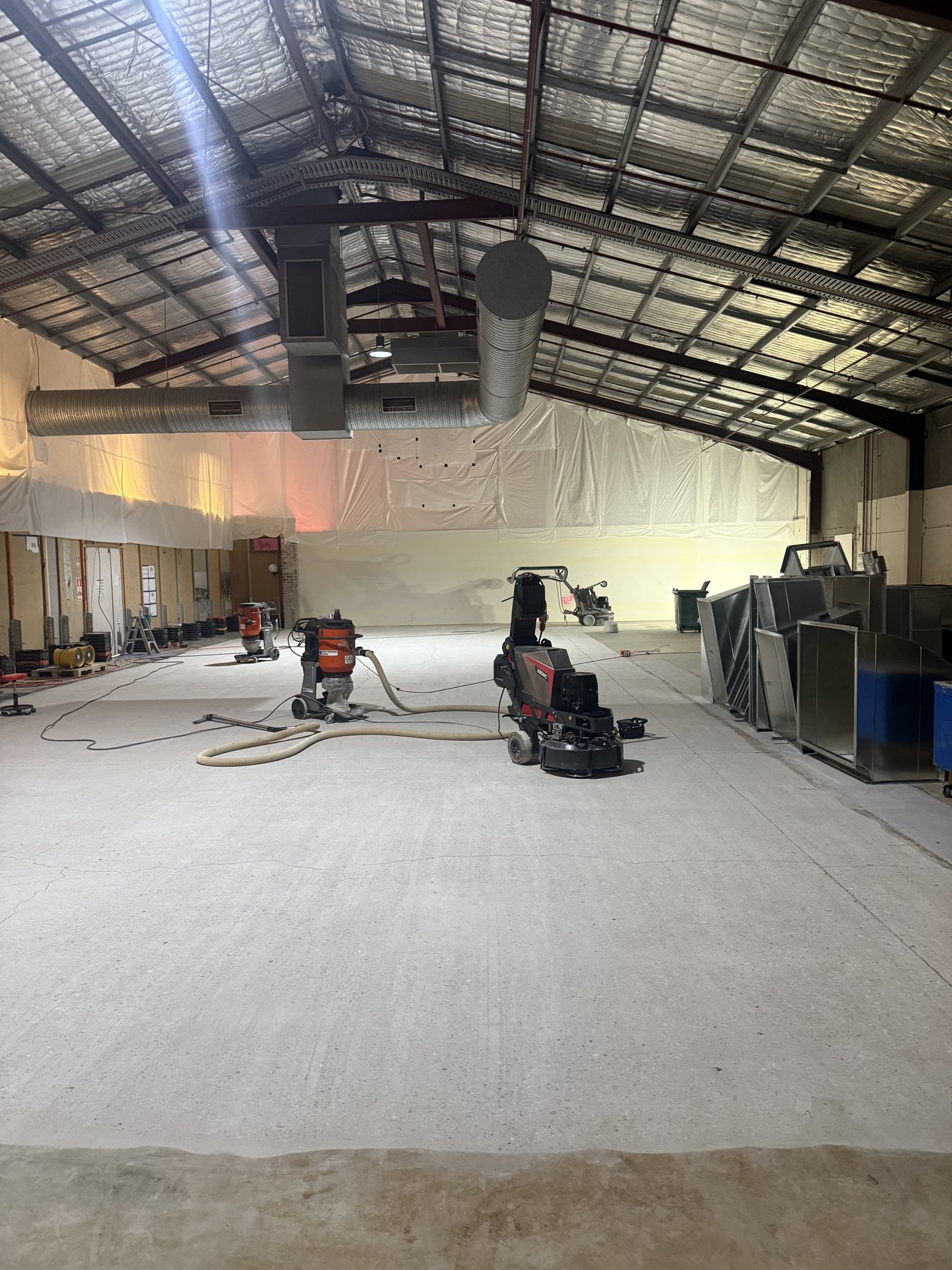 Progressive diamond refinement during commercial concrete polishing near Liverpool
