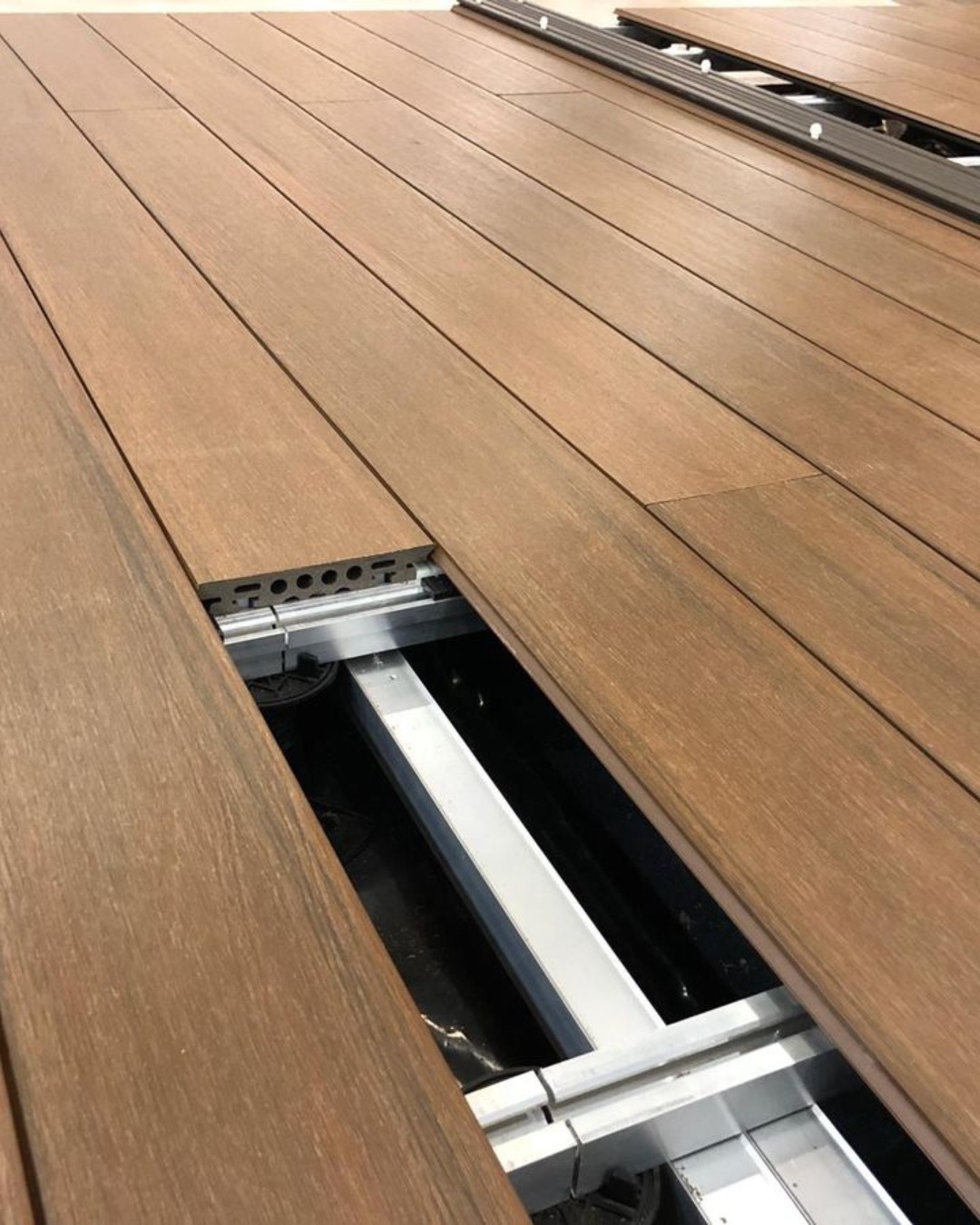 Aluminium joists laid out as a deck substructure before Tarimatec boards are fixed down