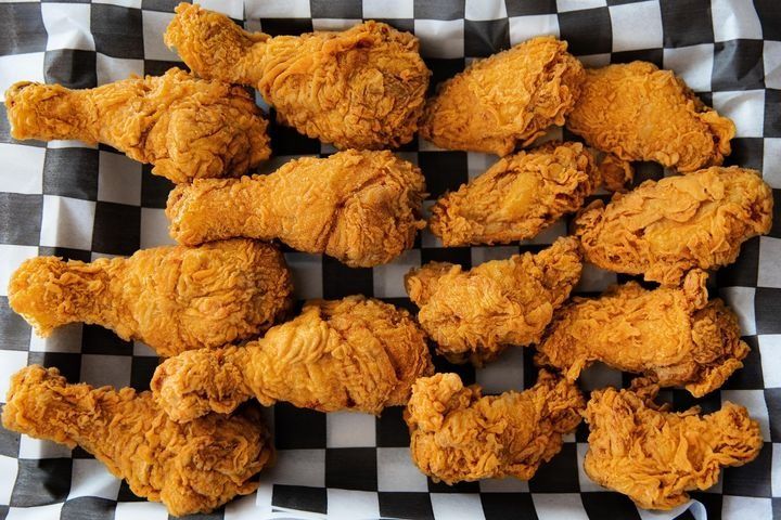 A large platter with 8 crispy wings and 6 drumsticks.