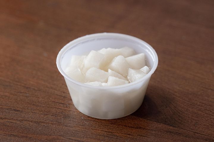 A side of tangy pickled daikon radish.